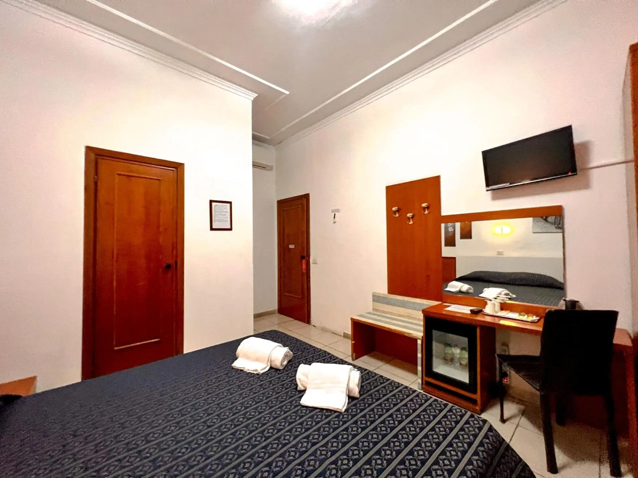 Bed in Alius and Freerome Hotel