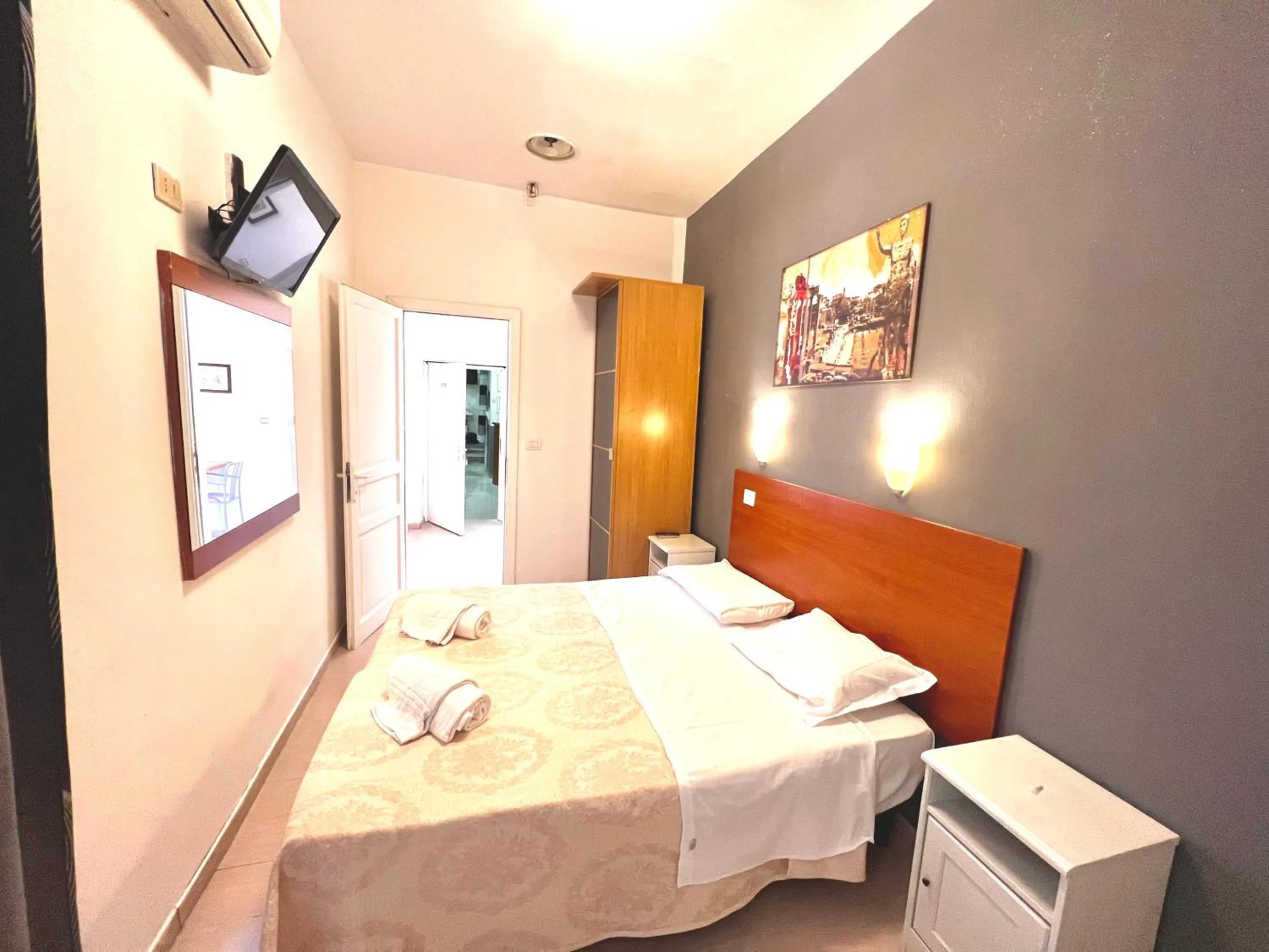 Bed in Alius and Freerome Hotel