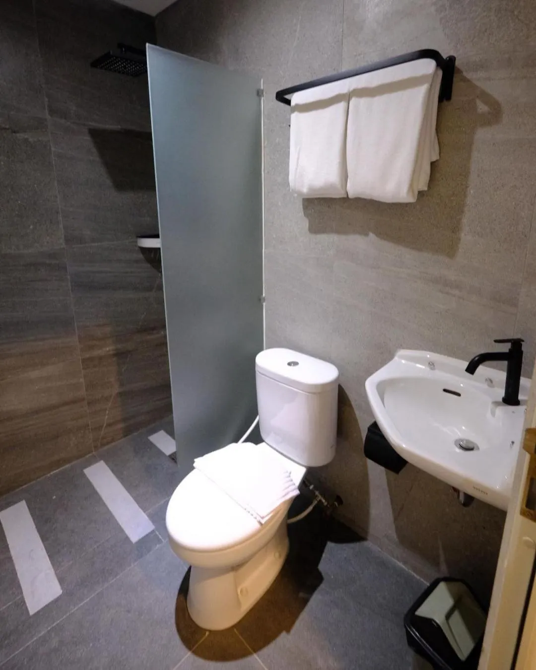 Bathroom in Americano Hotel Syariah Yogyakarta