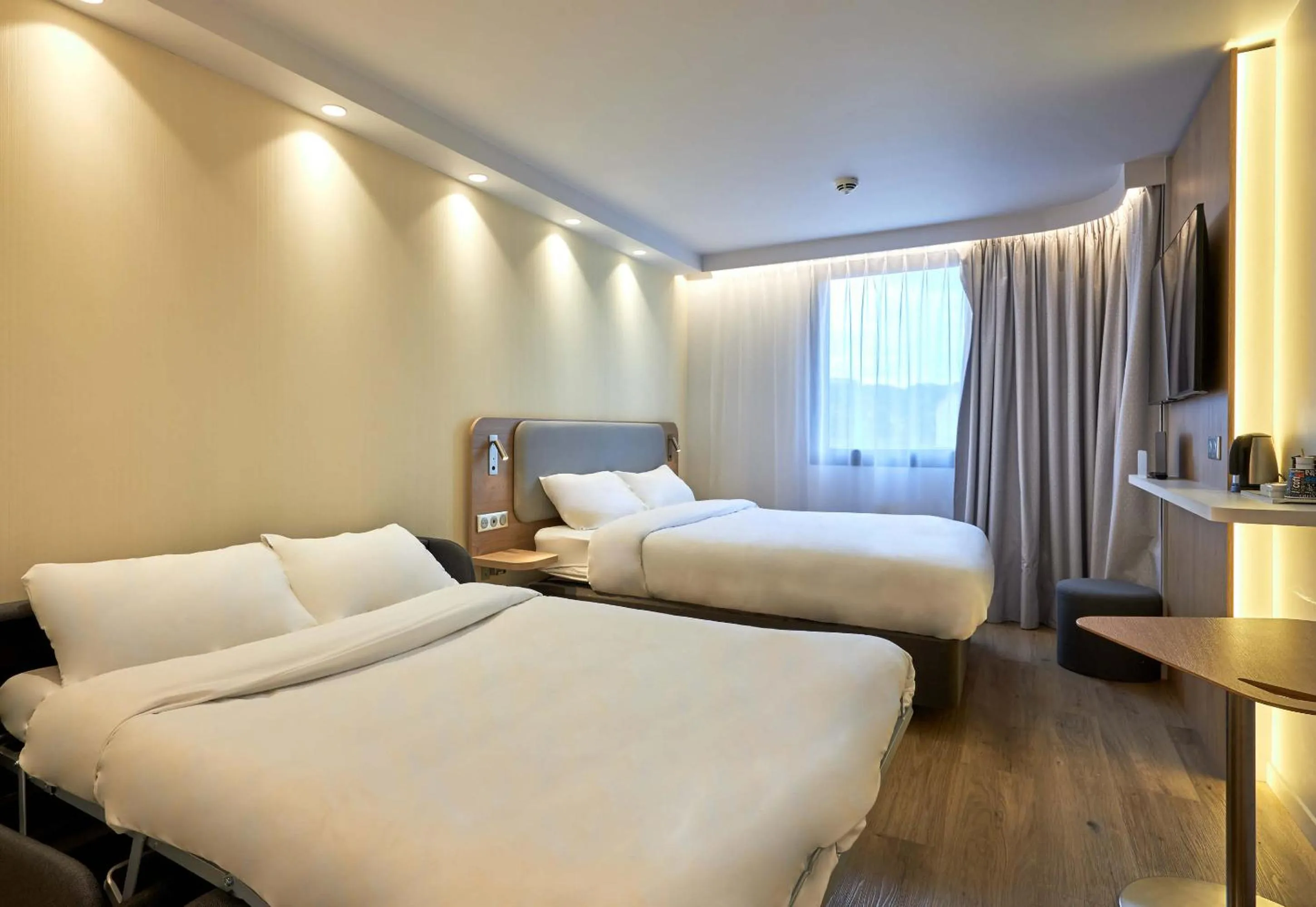 Photo of the whole room, Bed in B&B HOTEL Deauville-Touques