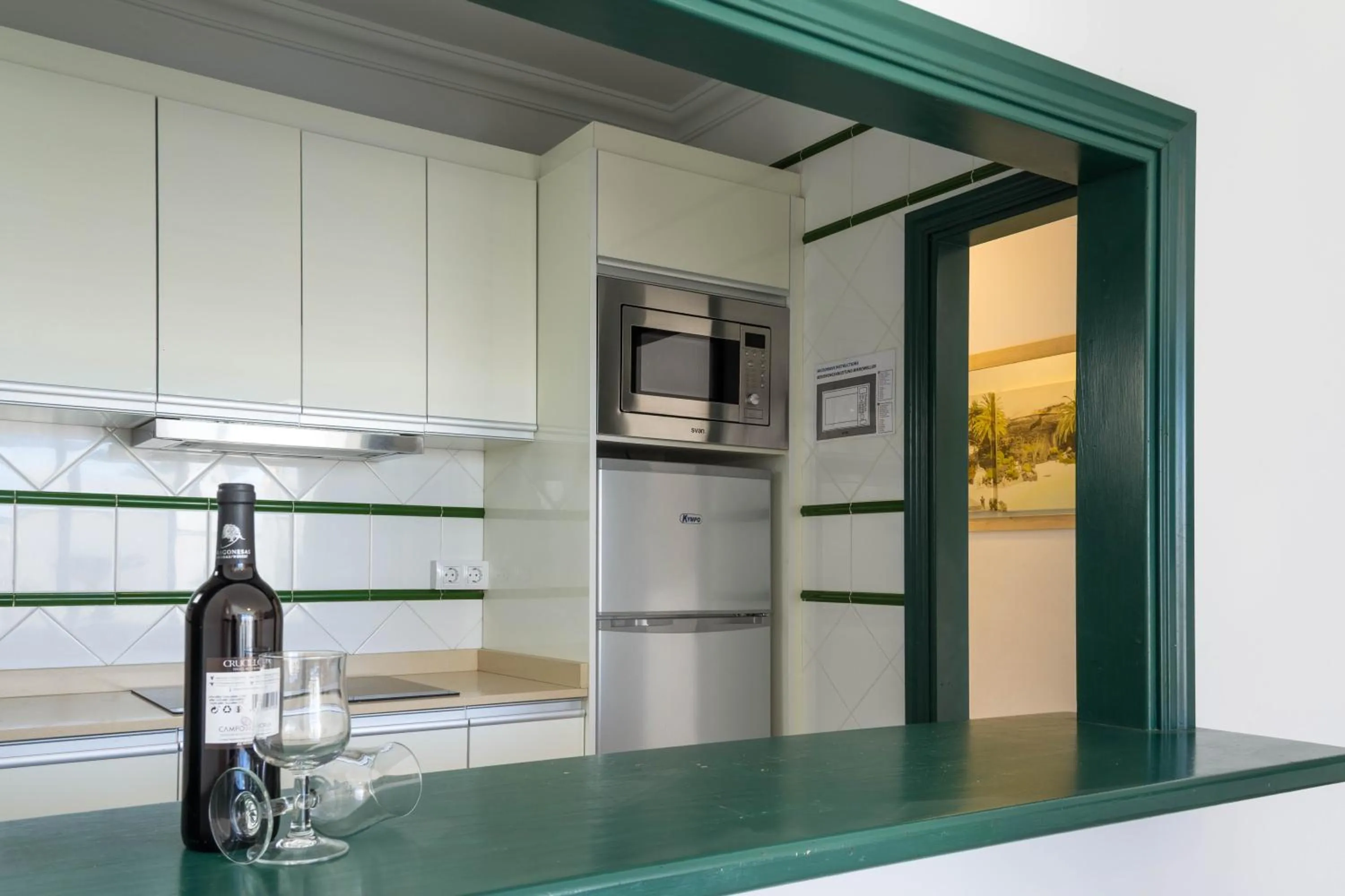 Kitchen or kitchenette in Apartamentos La Tegala