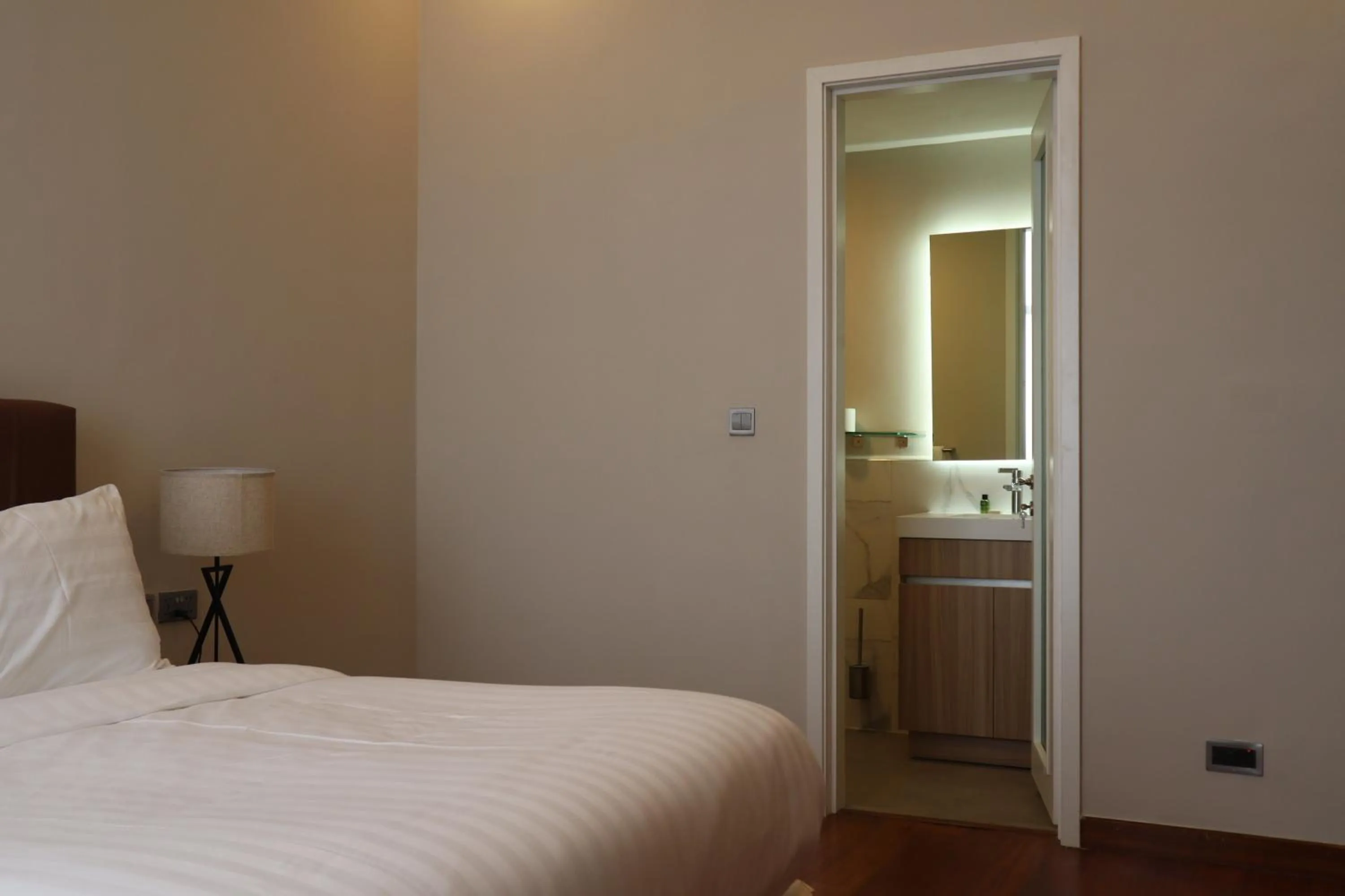 Bed in The Curve by the Park Apartments