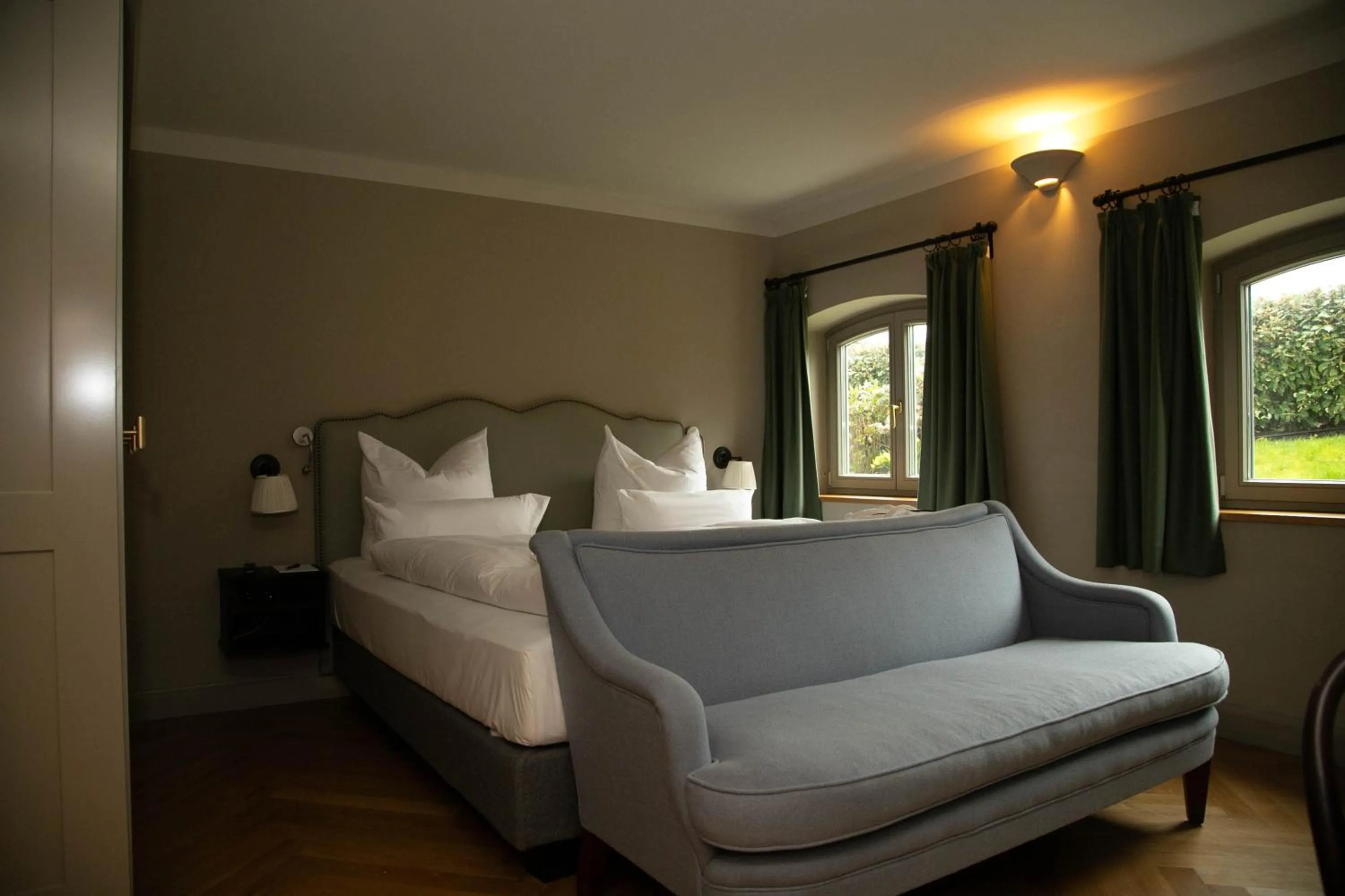 Bed in Mimosa Suites