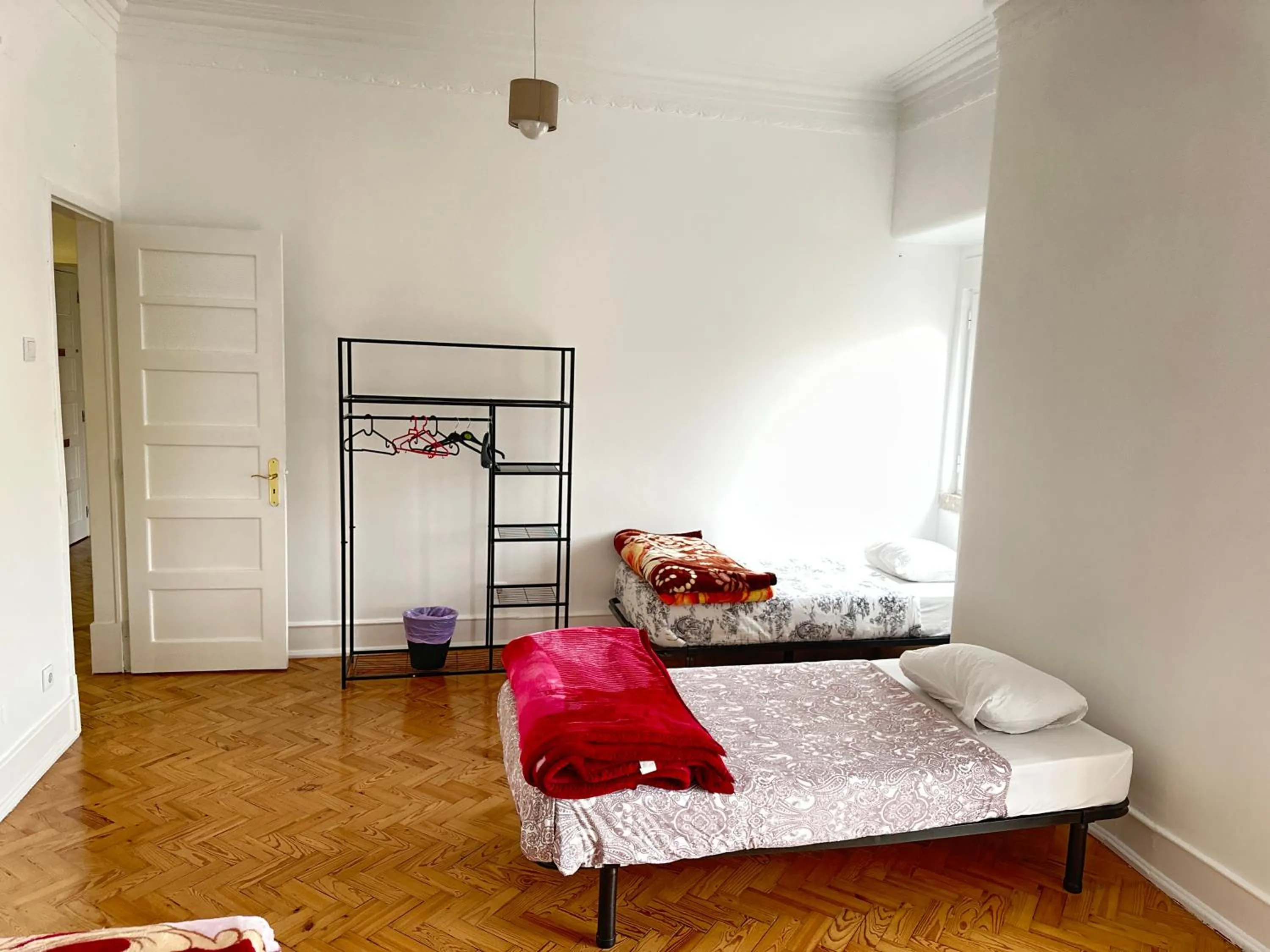 Bed in Rainbow Guest House