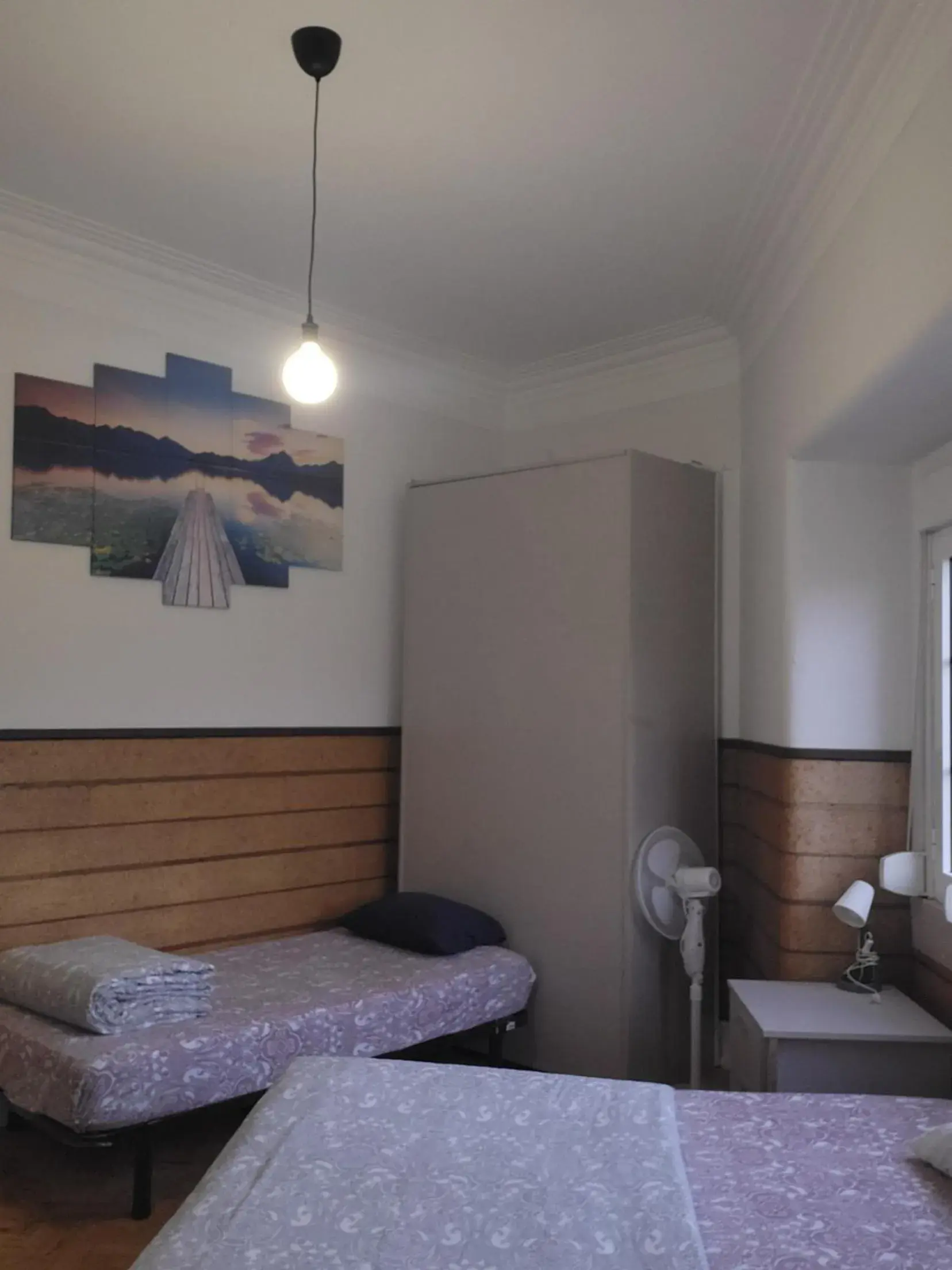 Basic Triple Room with Shared Bathroom in Rainbow Guest House Basic Triple Room with Shared Bathroom in Rainbow Guest House