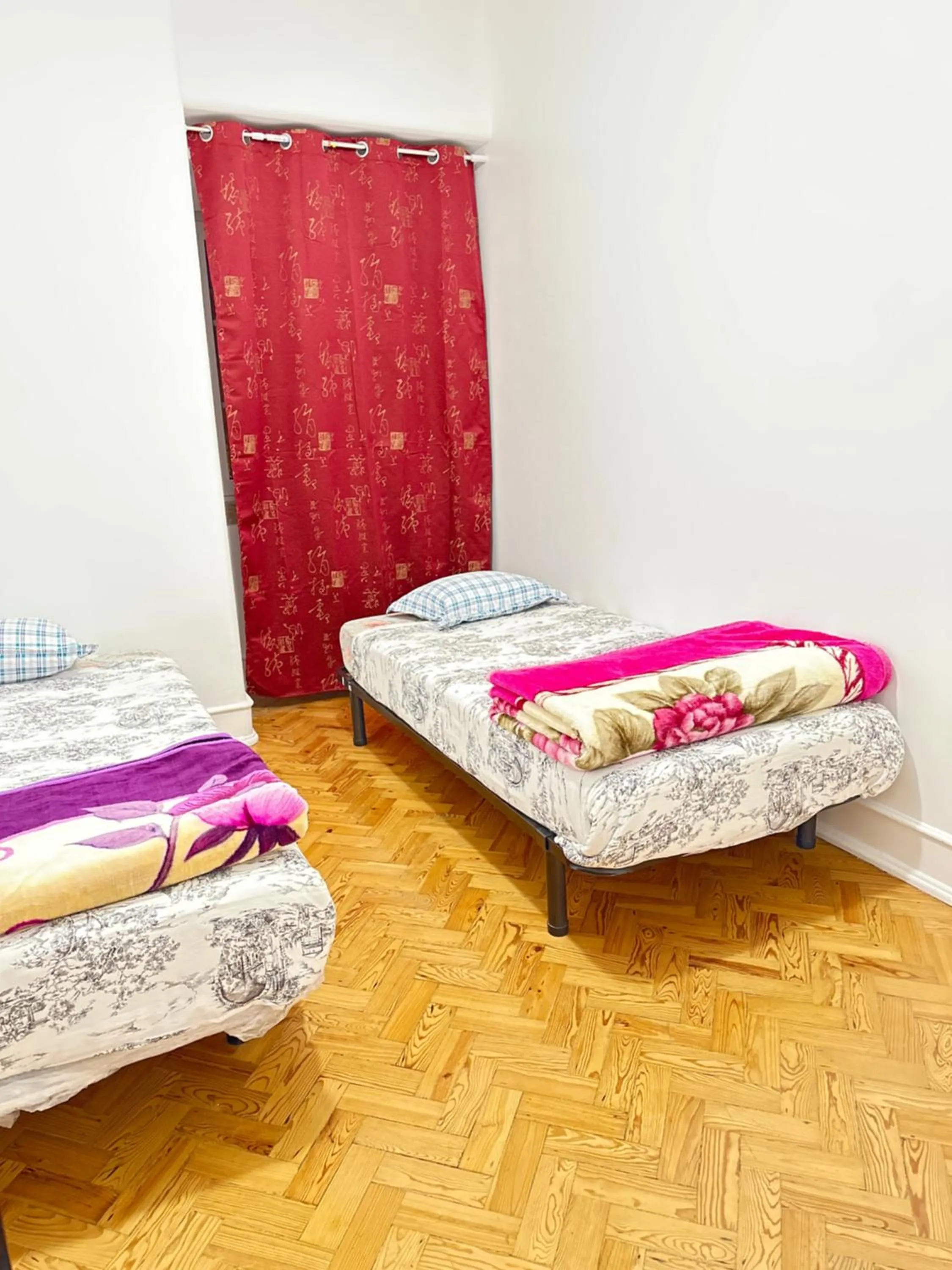 Bed in Rainbow Guest House