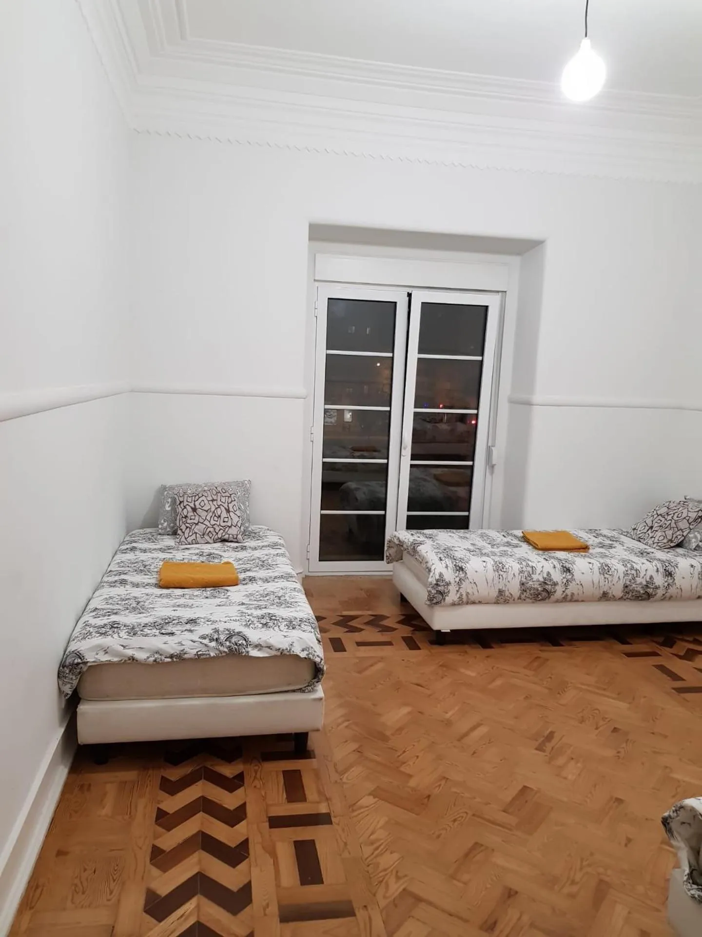 Bed in Rainbow Guest House