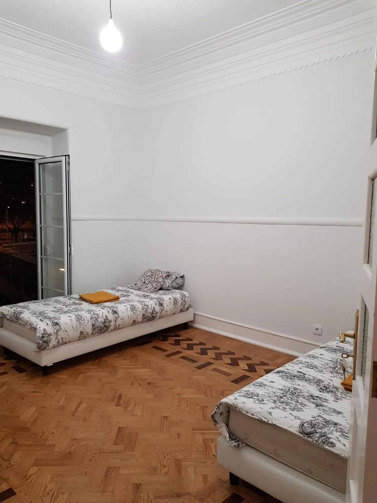 Bed in Rainbow Guest House