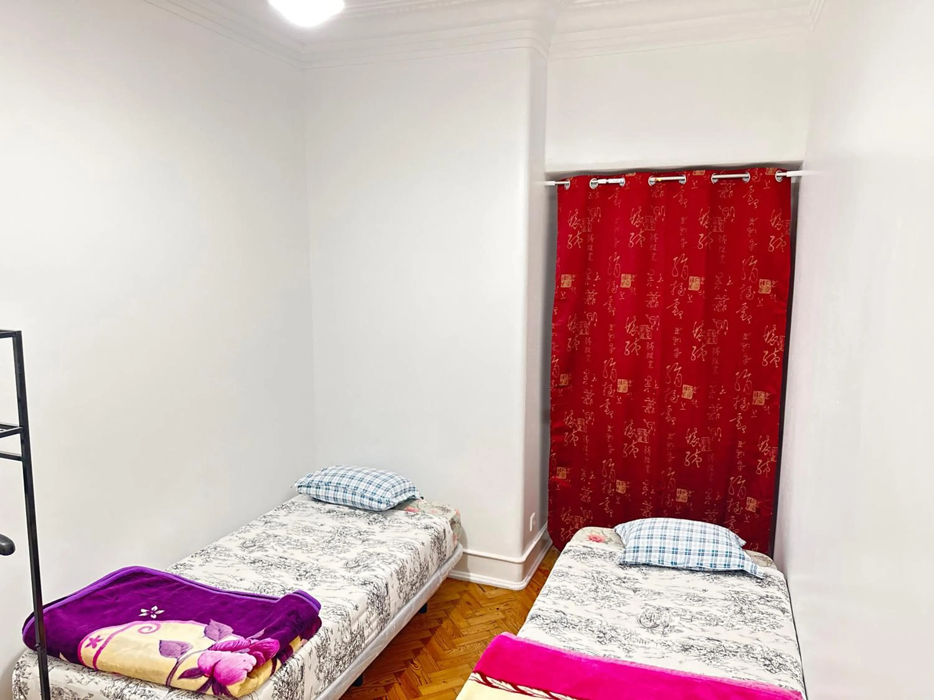 Bed in Rainbow Guest House