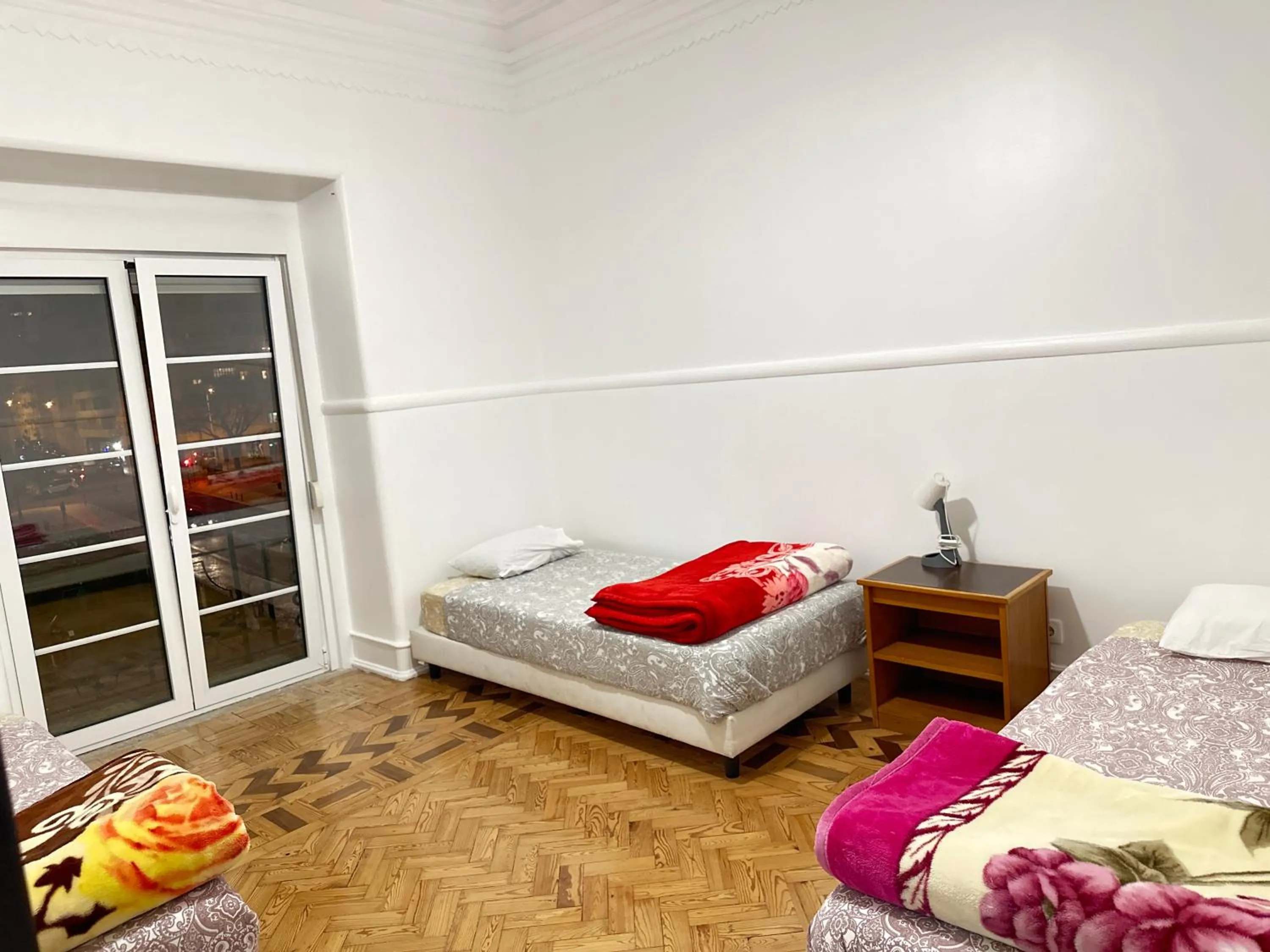 Bed in Rainbow Guest House