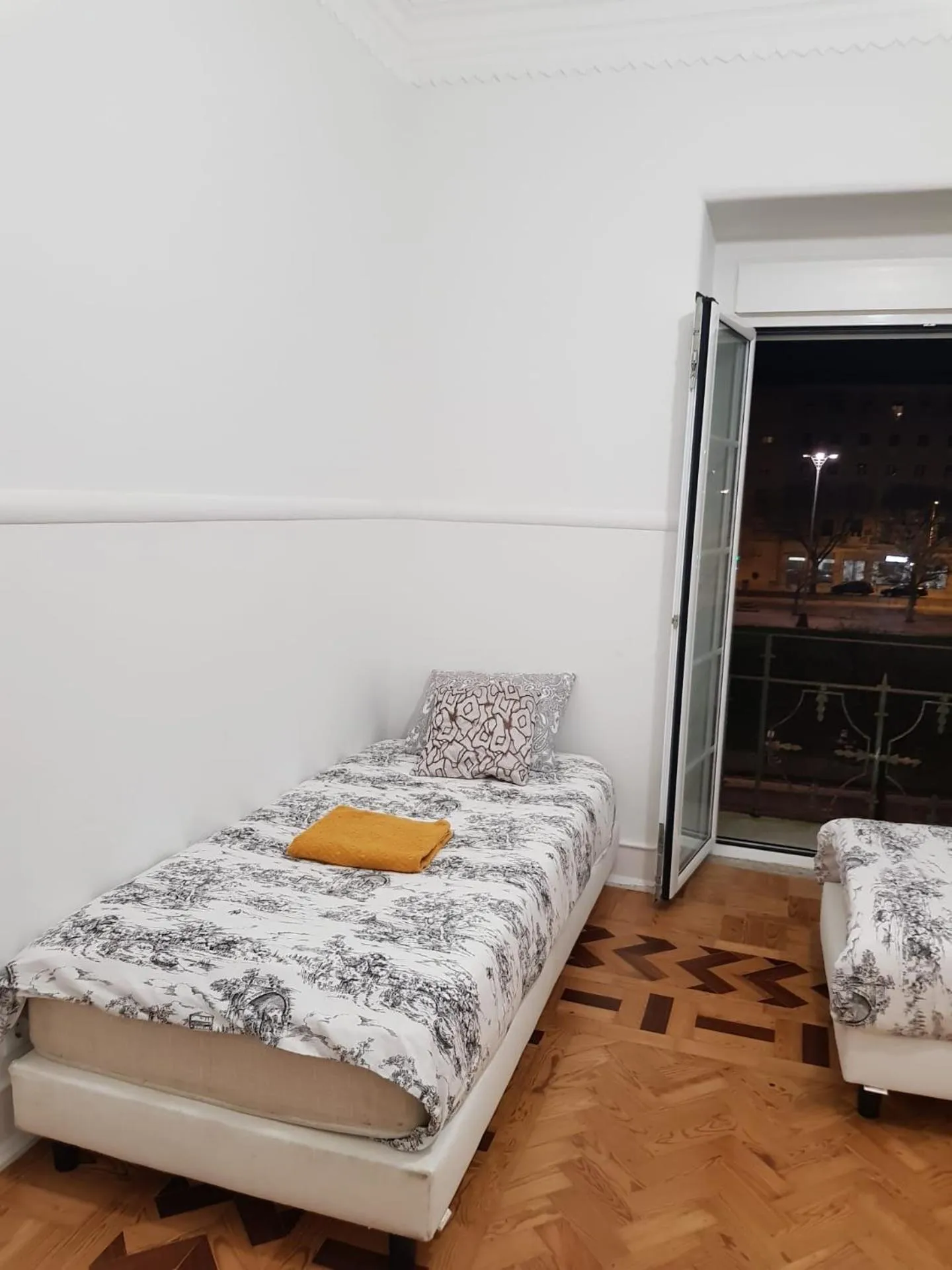 Bed in Rainbow Guest House