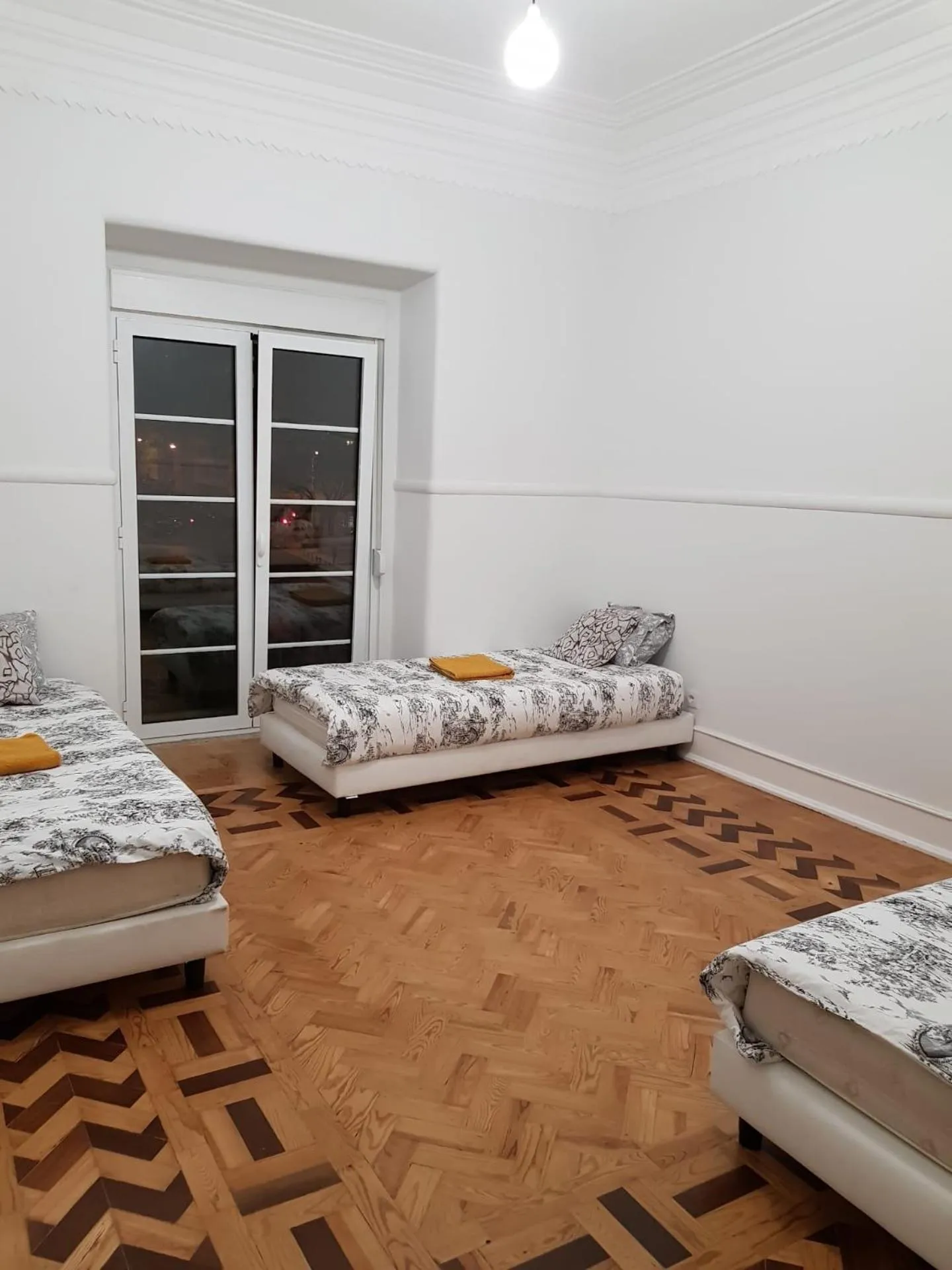 Bed in Rainbow Guest House