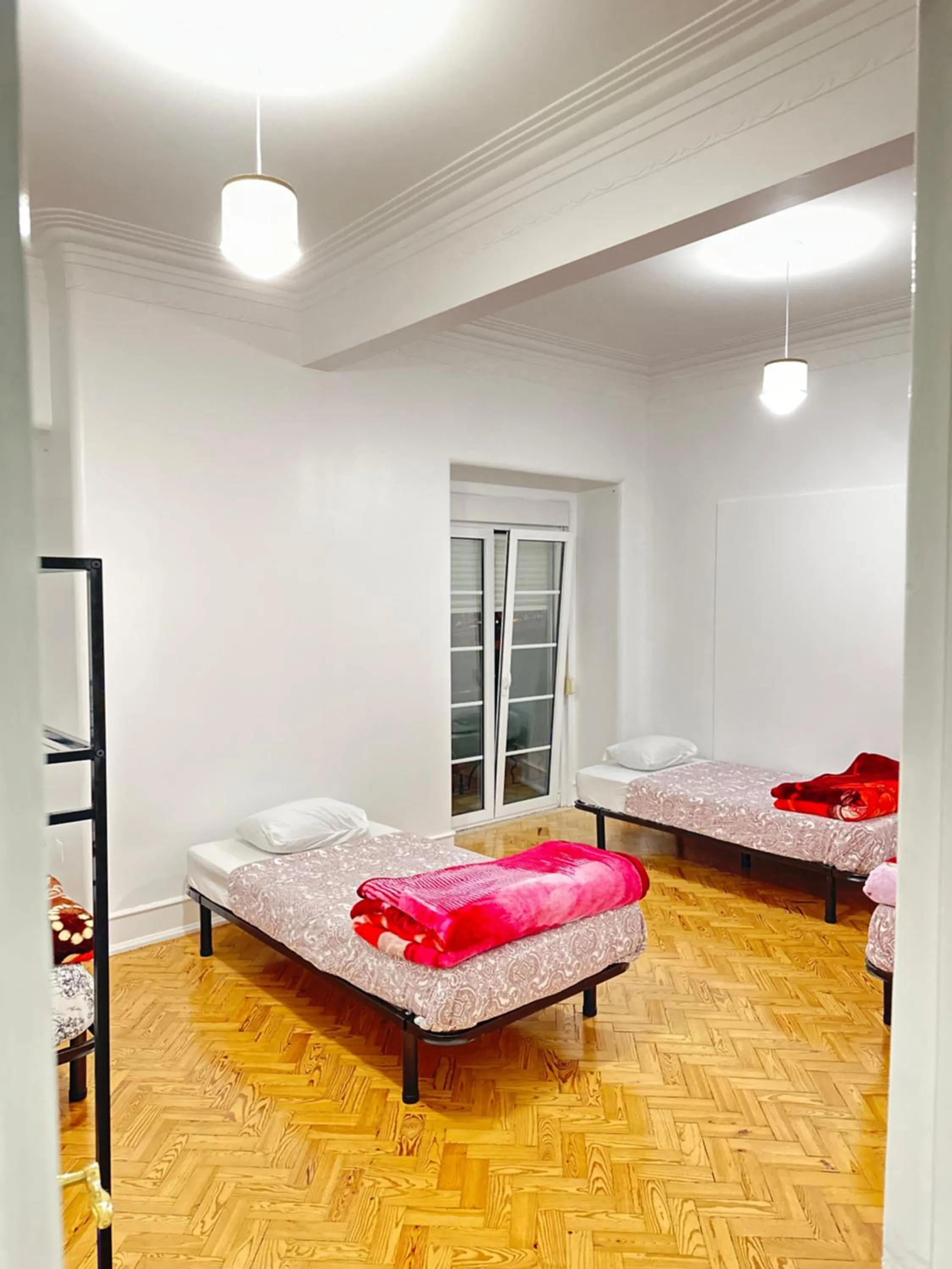 Bed in Rainbow Guest House