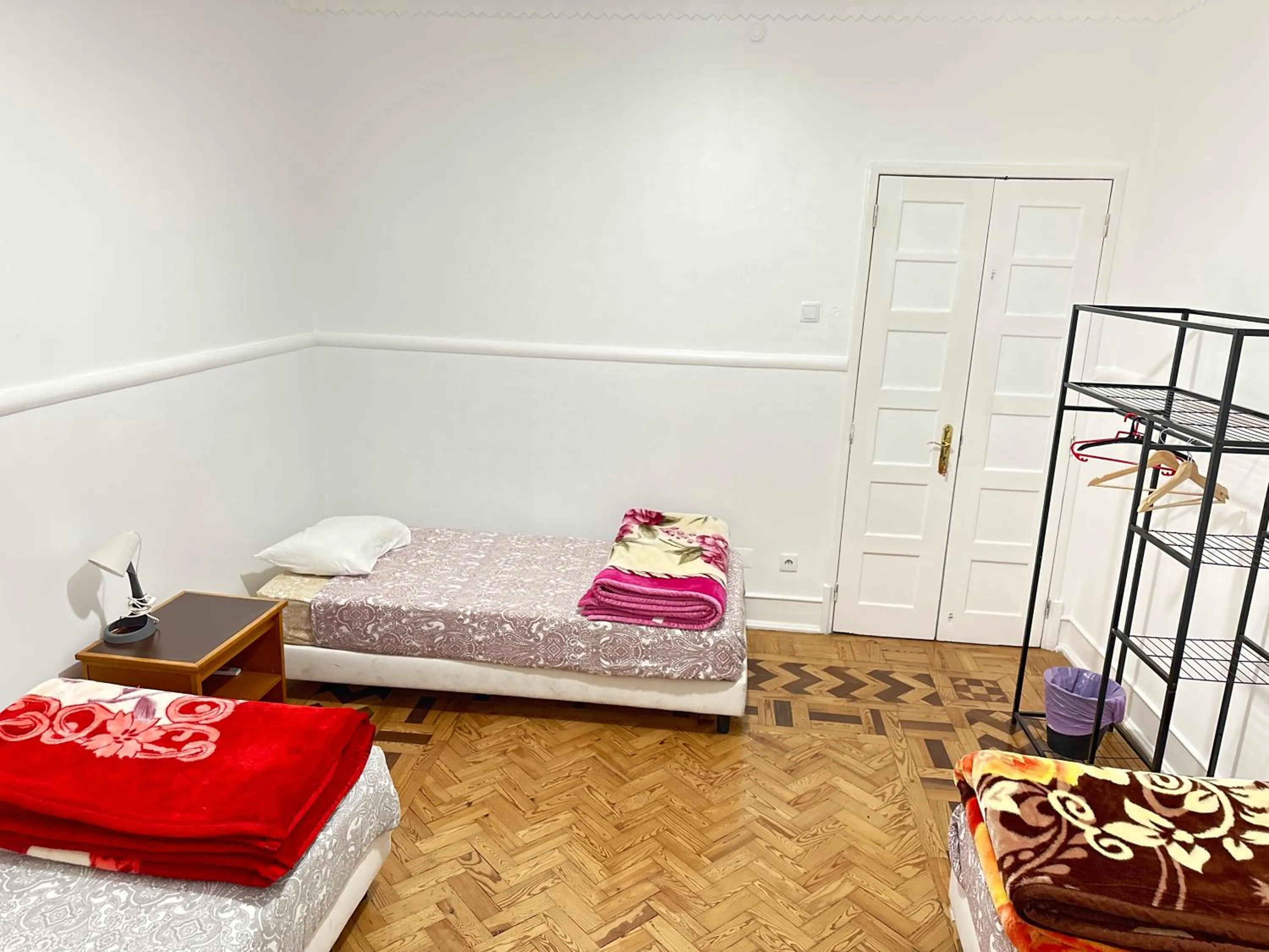 Bed in Rainbow Guest House