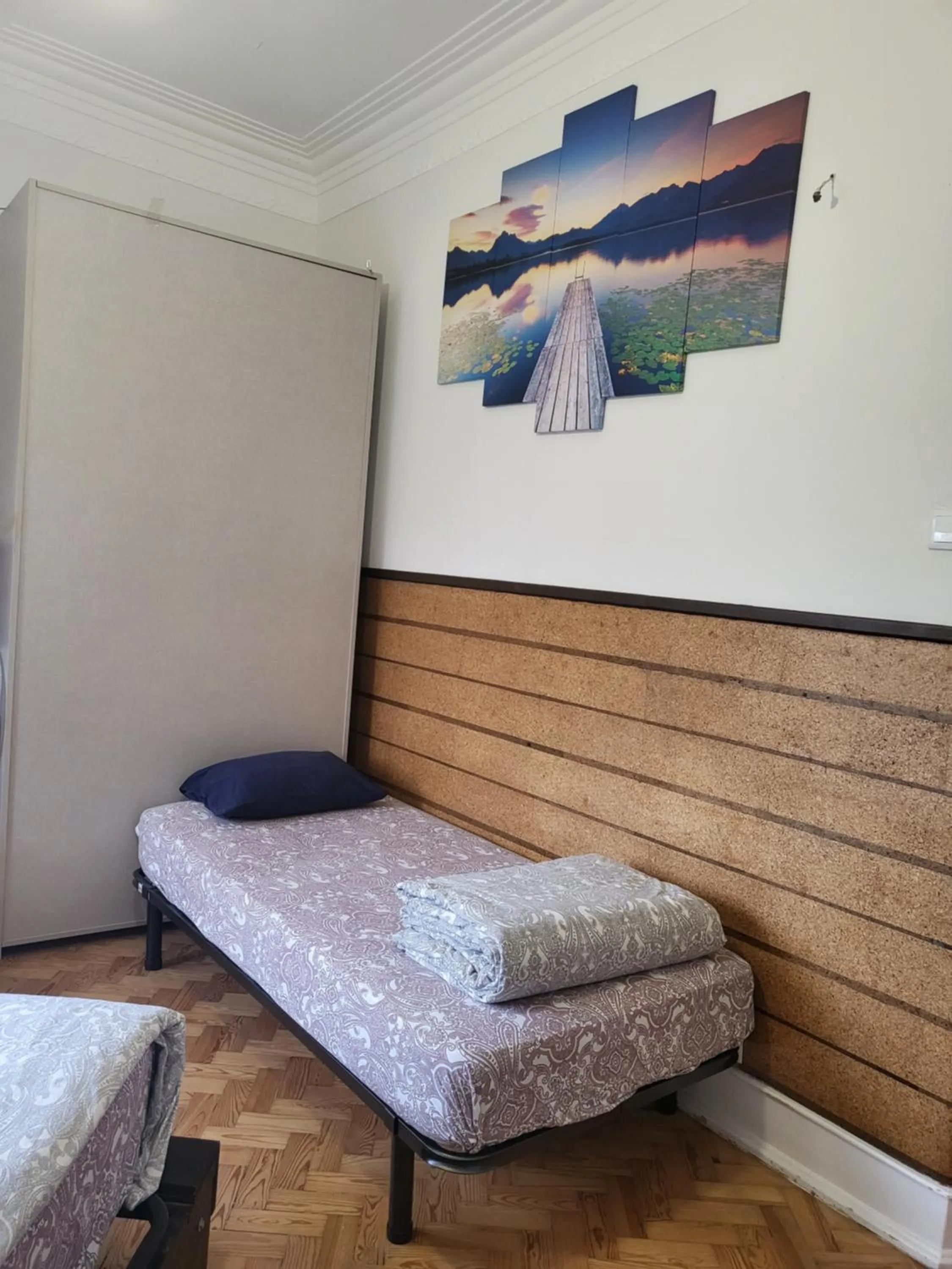 Bed in Rainbow Guest House