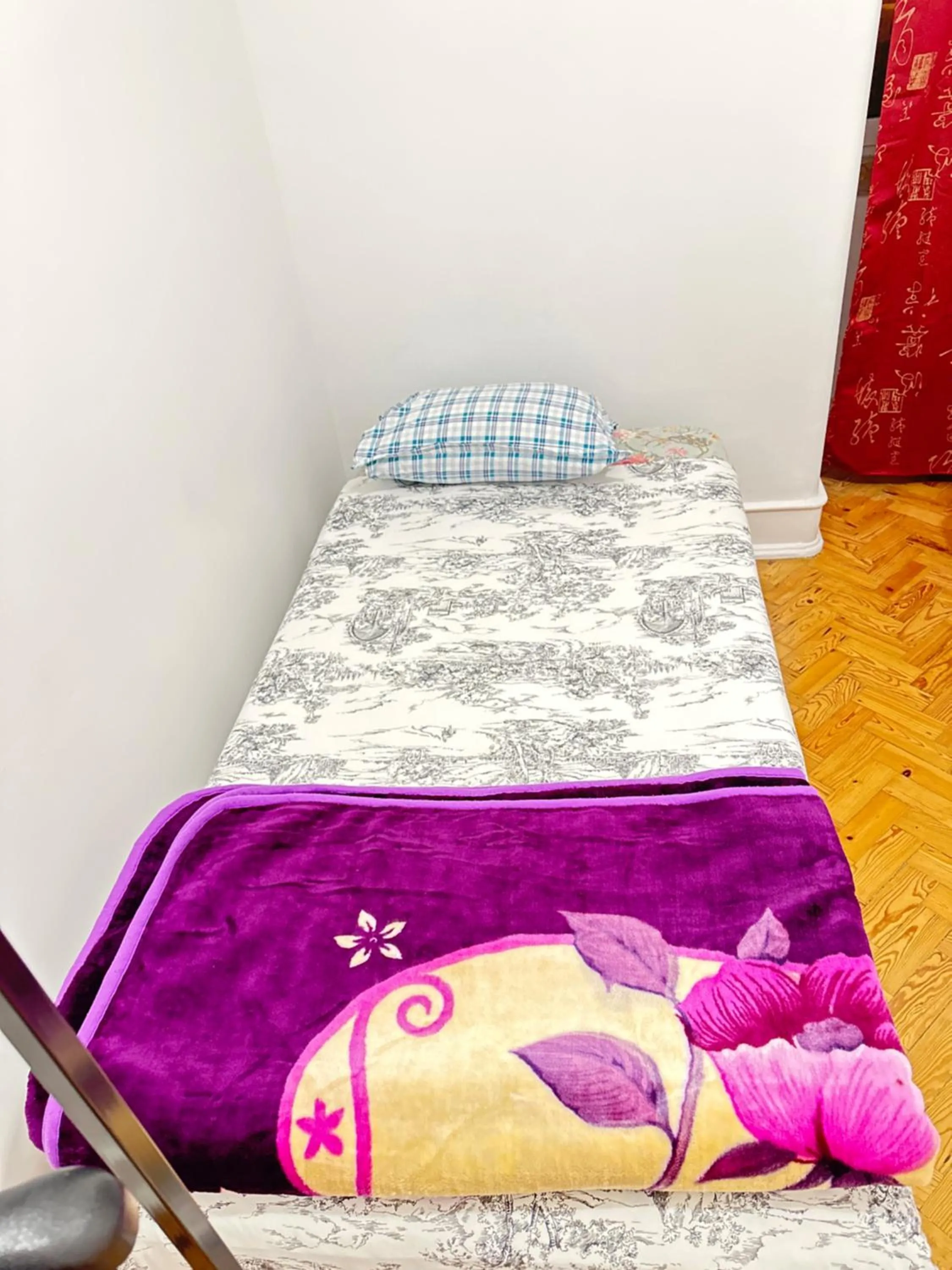 Bed in Rainbow Guest House