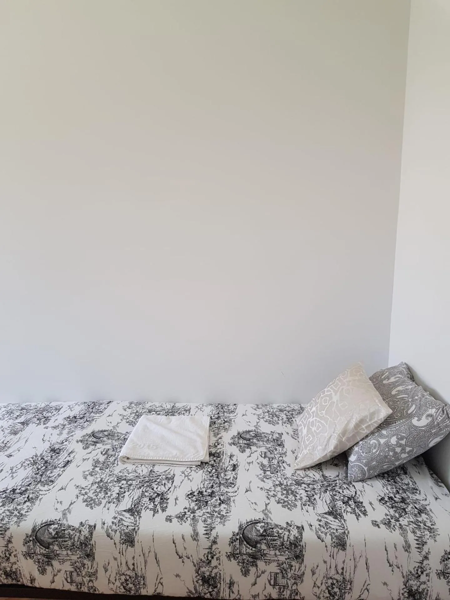 Bed in Rainbow Guest House