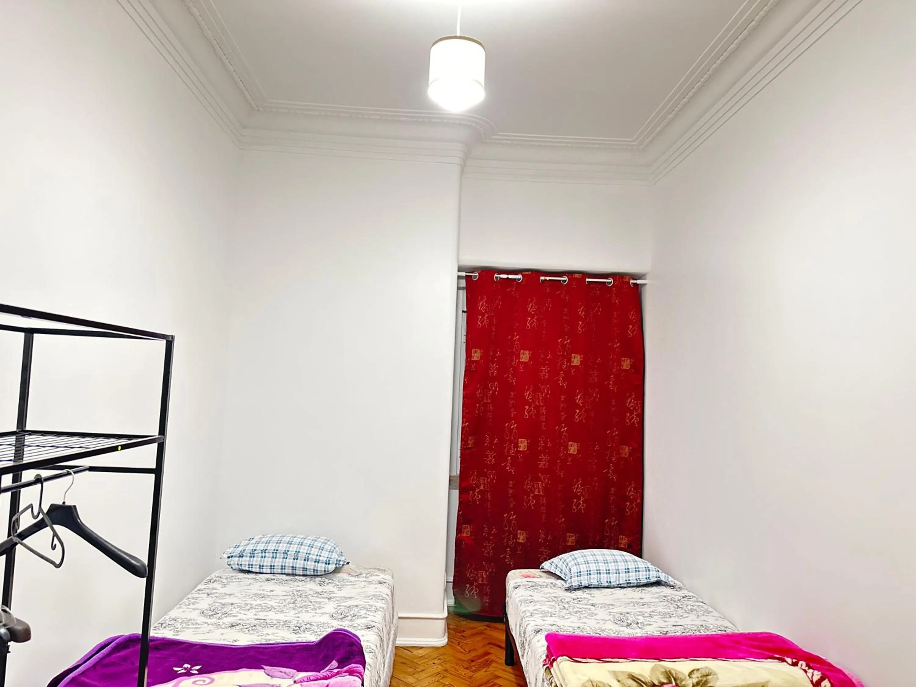 Bed in Rainbow Guest House