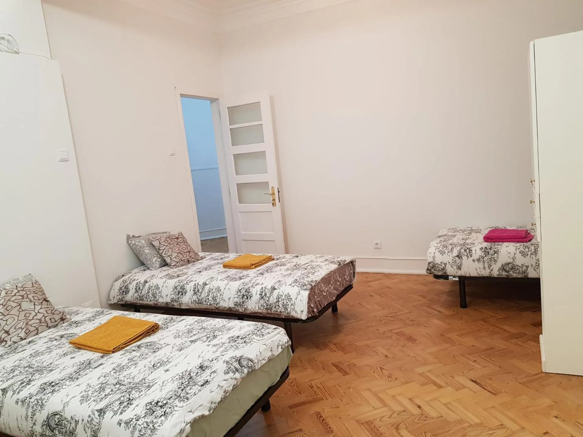 Bed in Rainbow Guest House