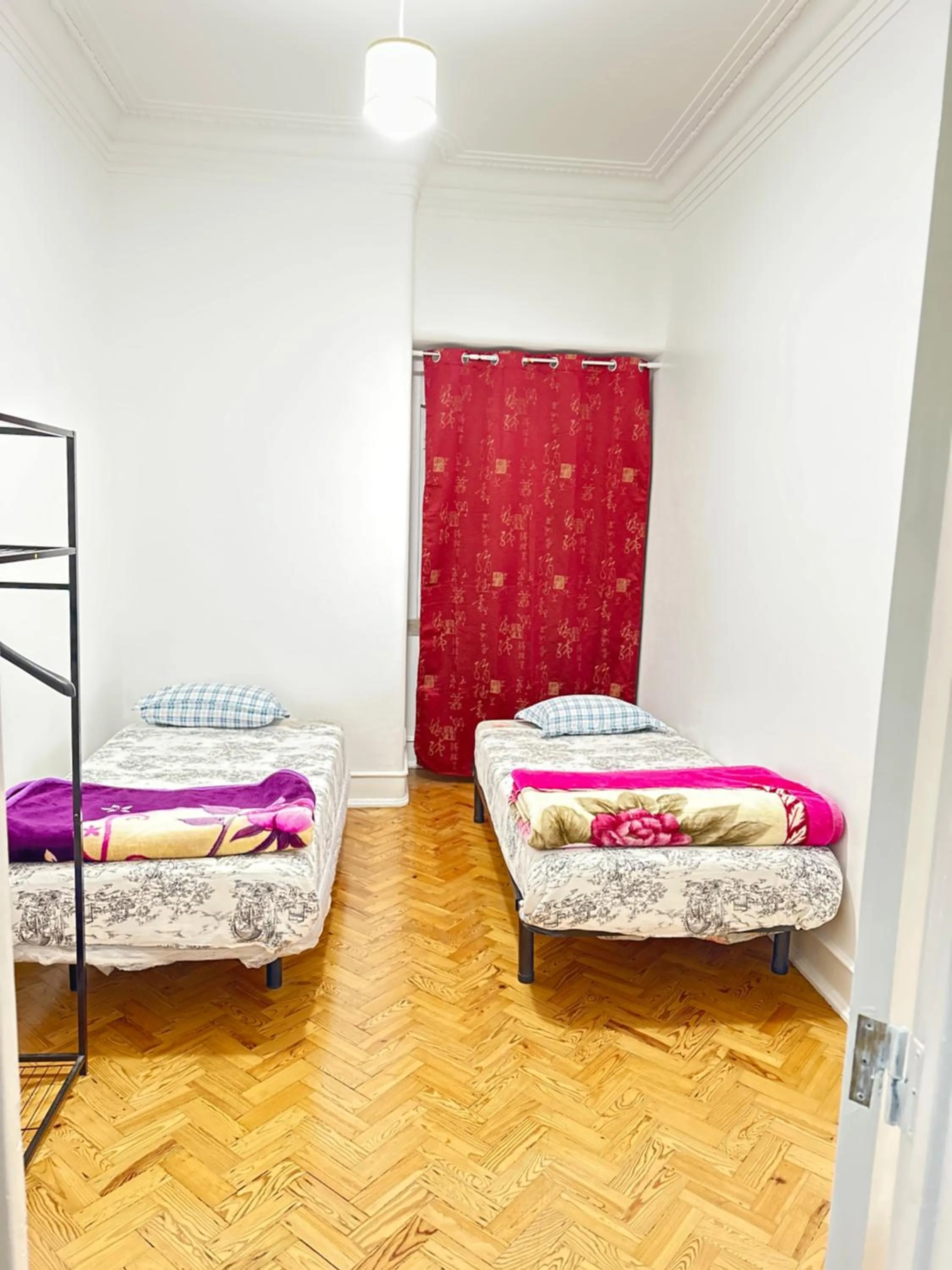 Bed in Rainbow Guest House