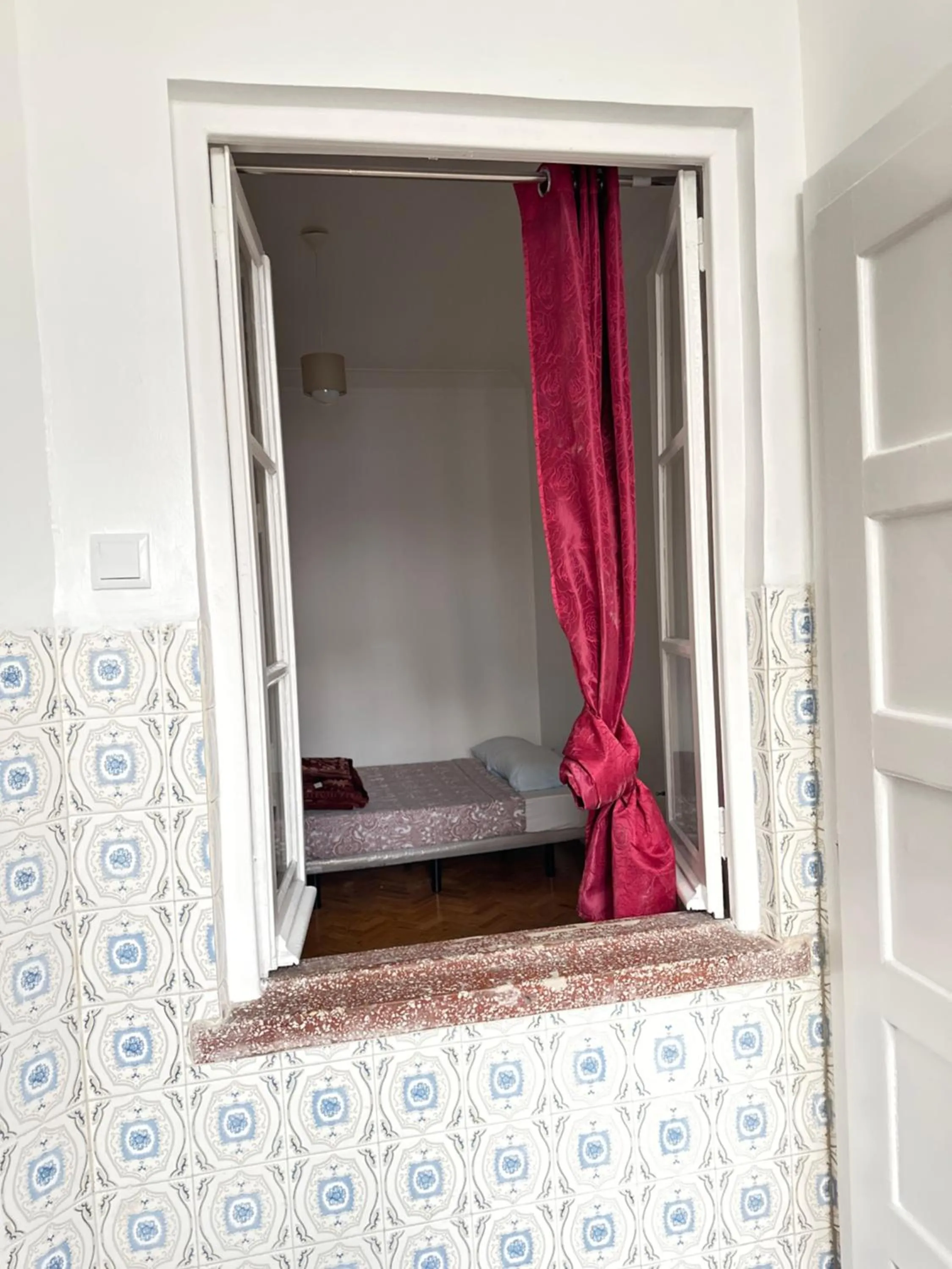 Bed in Rainbow Guest House