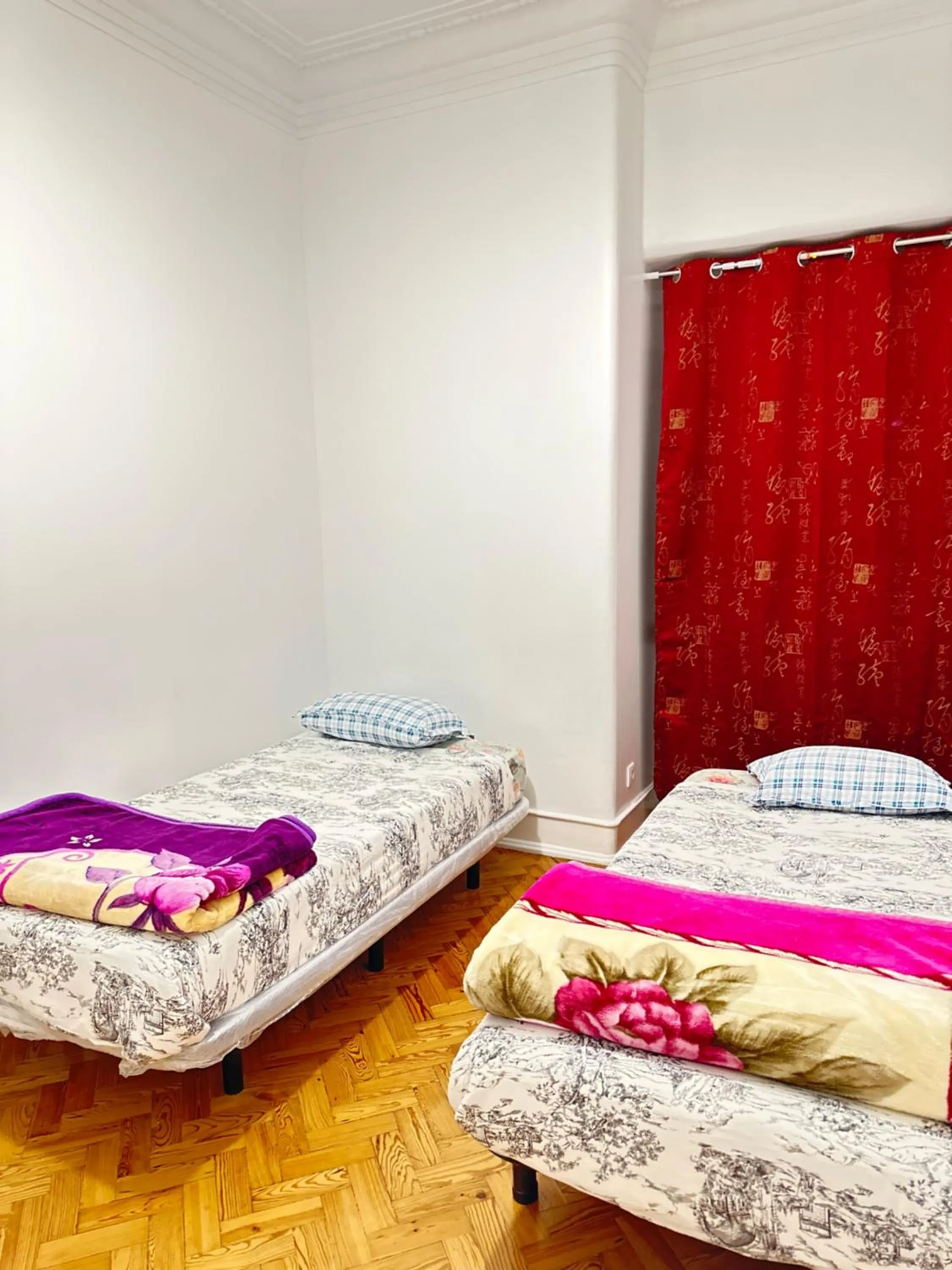 Bed in Rainbow Guest House