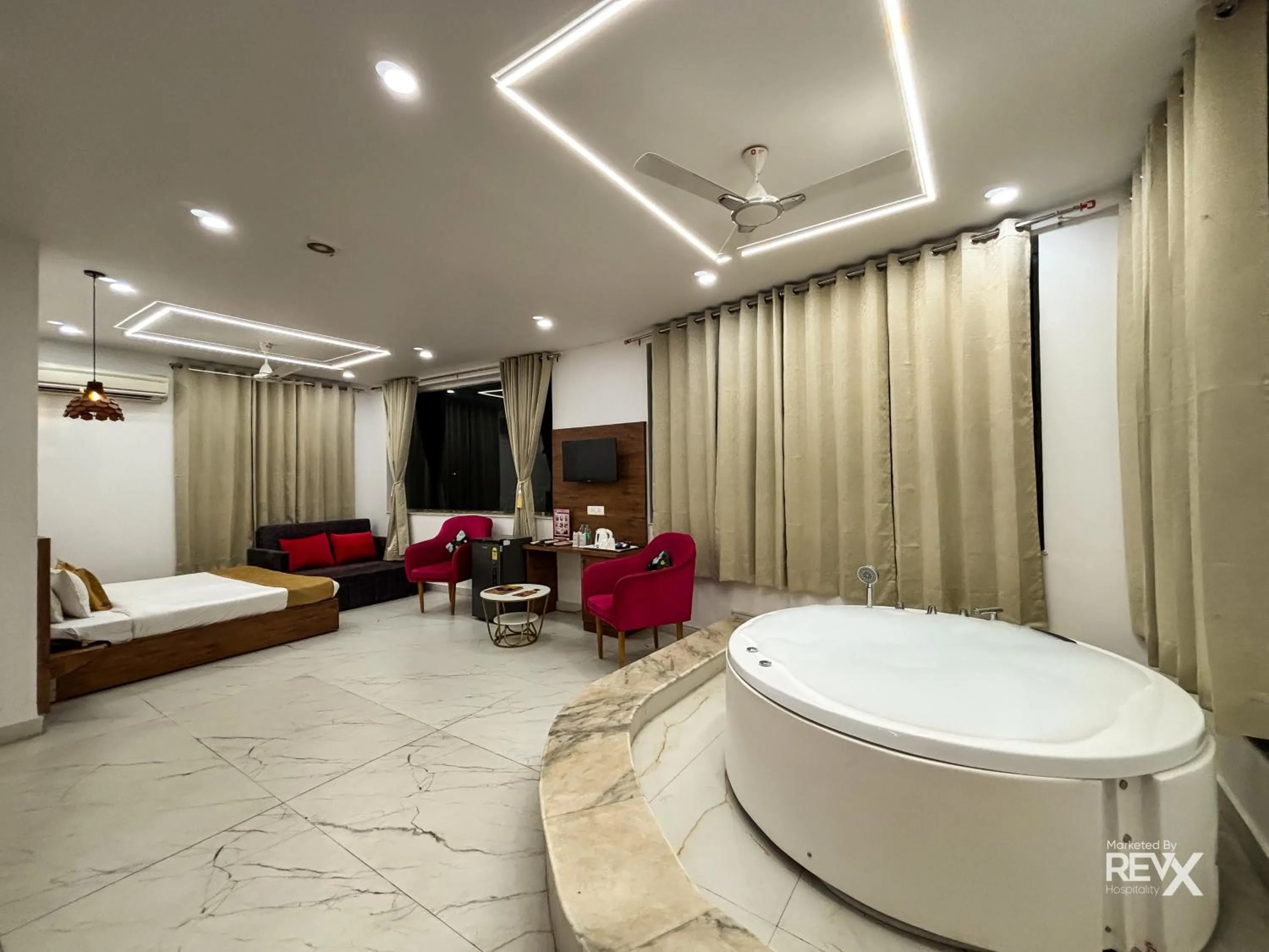 Bed in The Neeraj River Forest Resort Ayurvedic Wellness Center