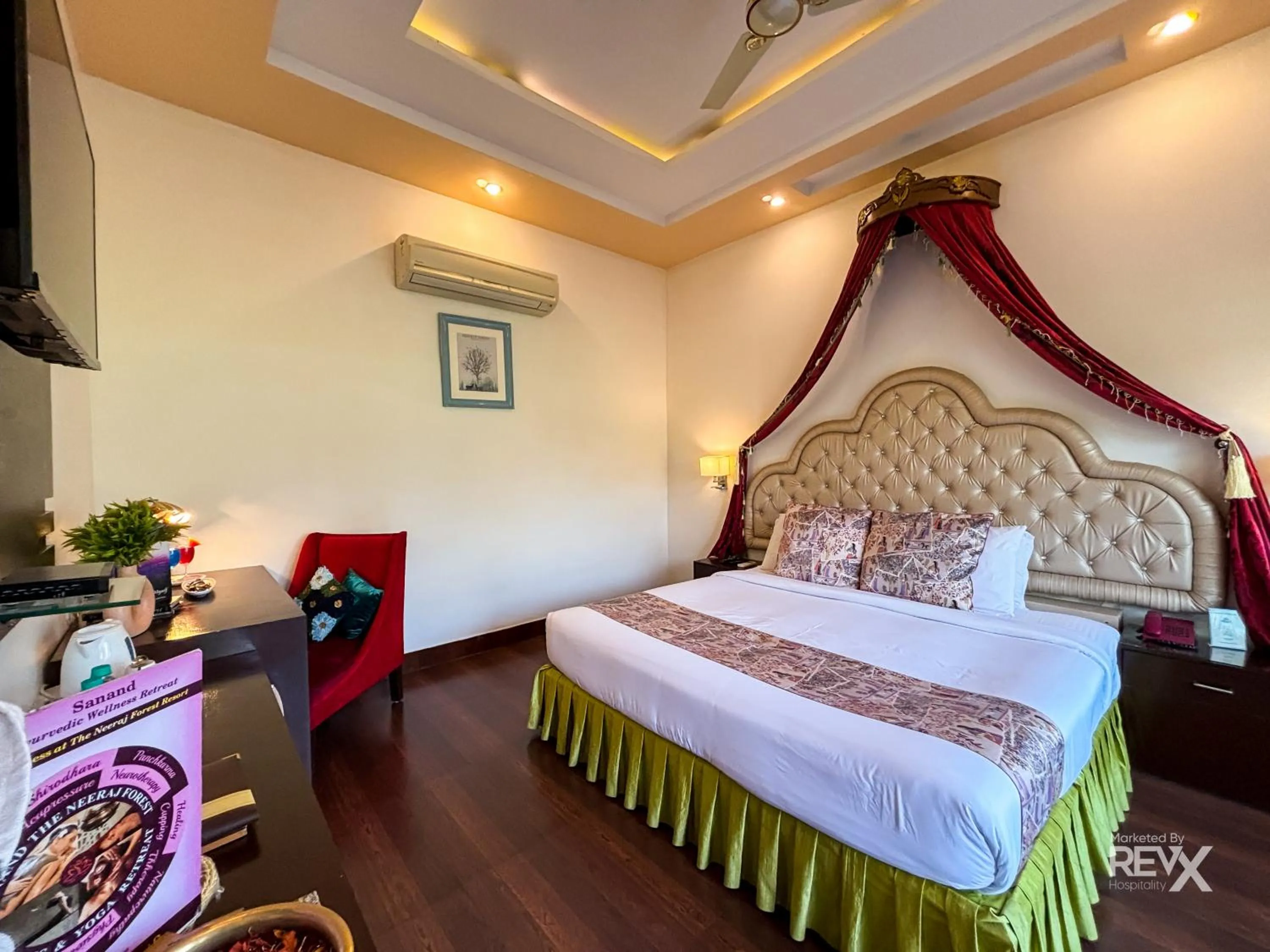 Bed in The Neeraj River Forest Resort Ayurvedic Wellness Center