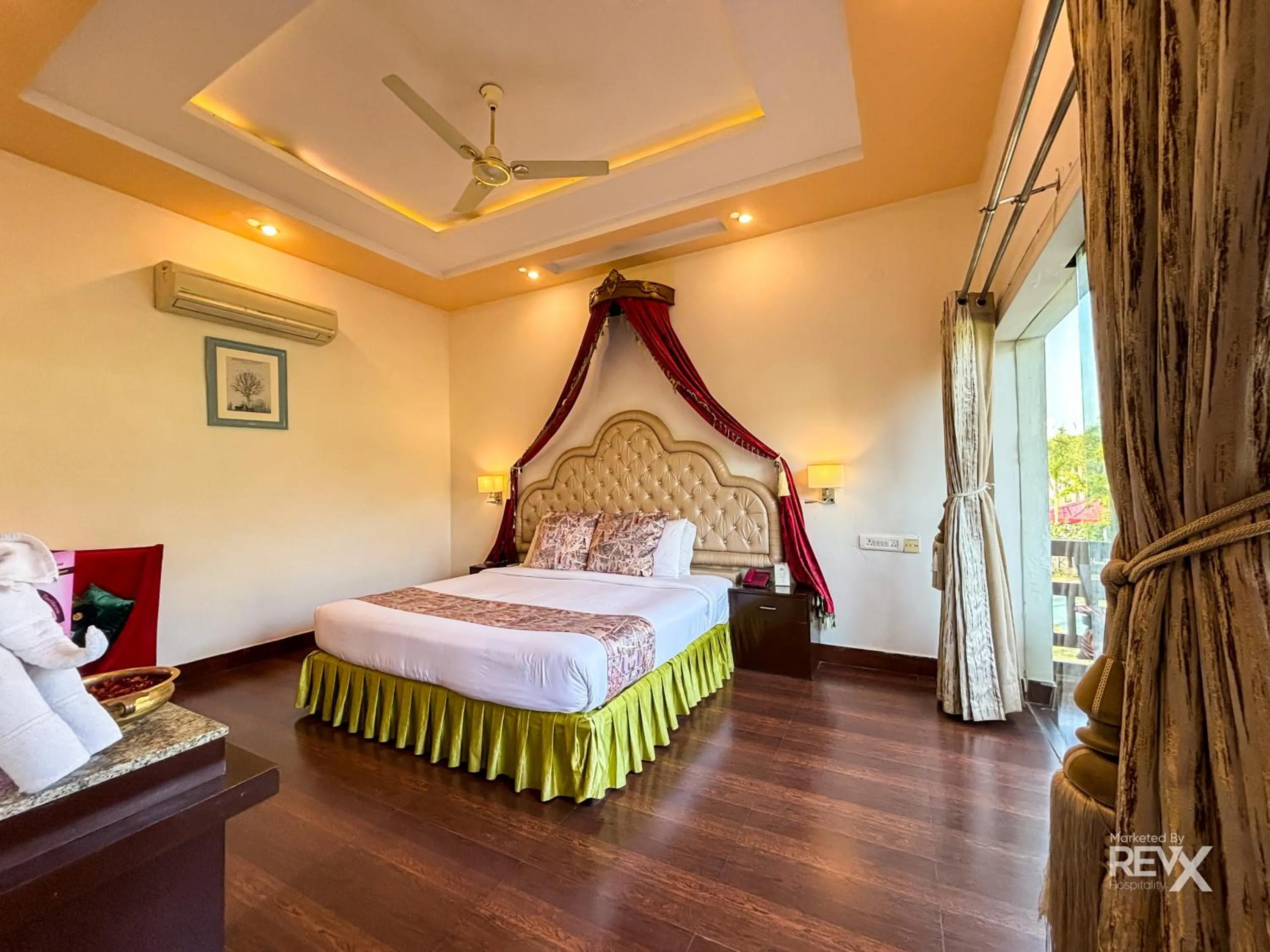Bed in The Neeraj River Forest Resort Ayurvedic Wellness Center