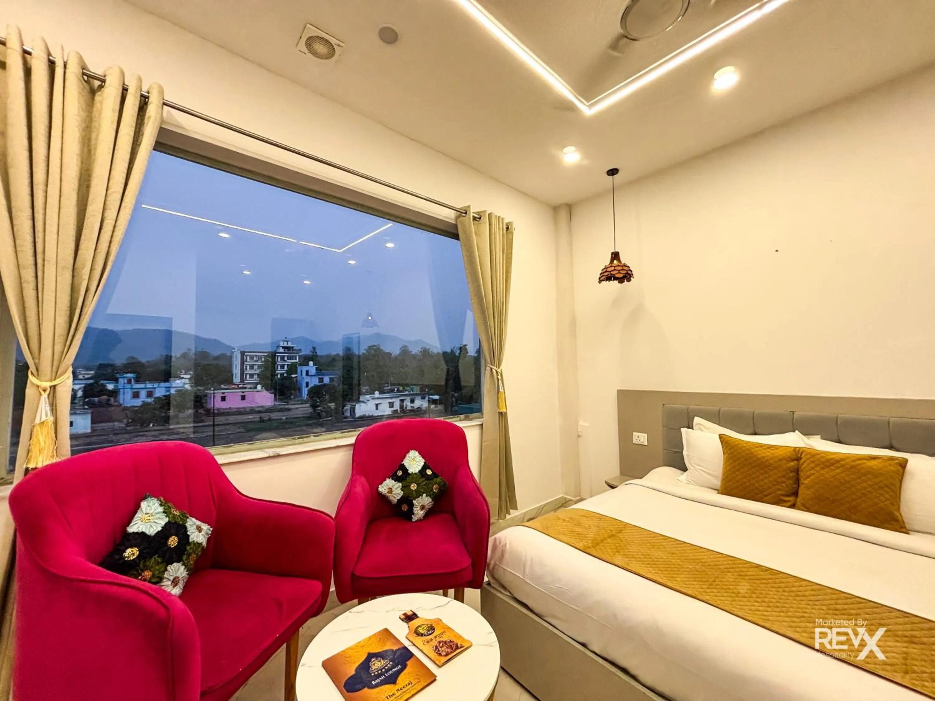 Bed in The Neeraj River Forest Resort Ayurvedic Wellness Center