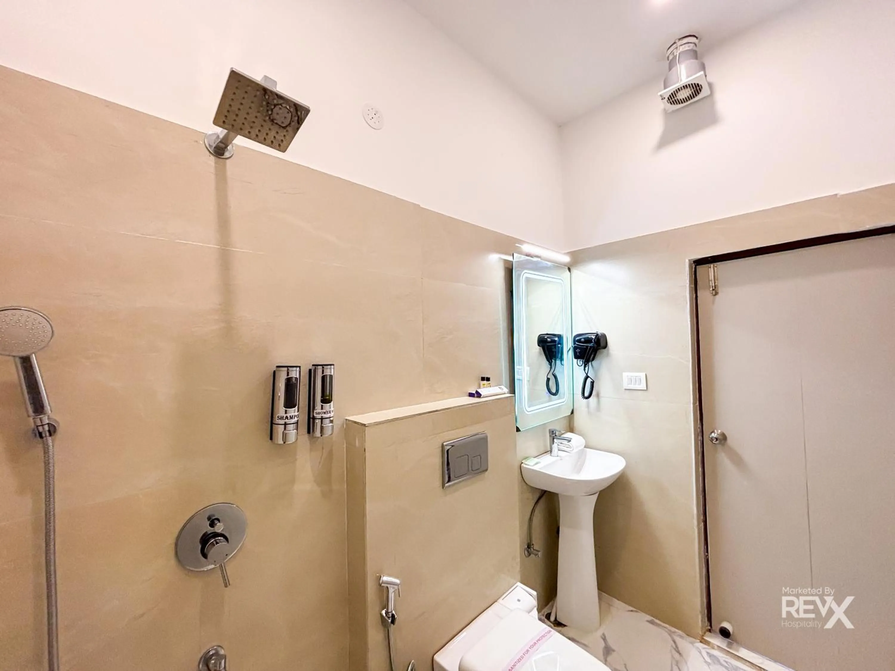 Bathroom in The Neeraj River Forest Resort Ayurvedic Wellness Center