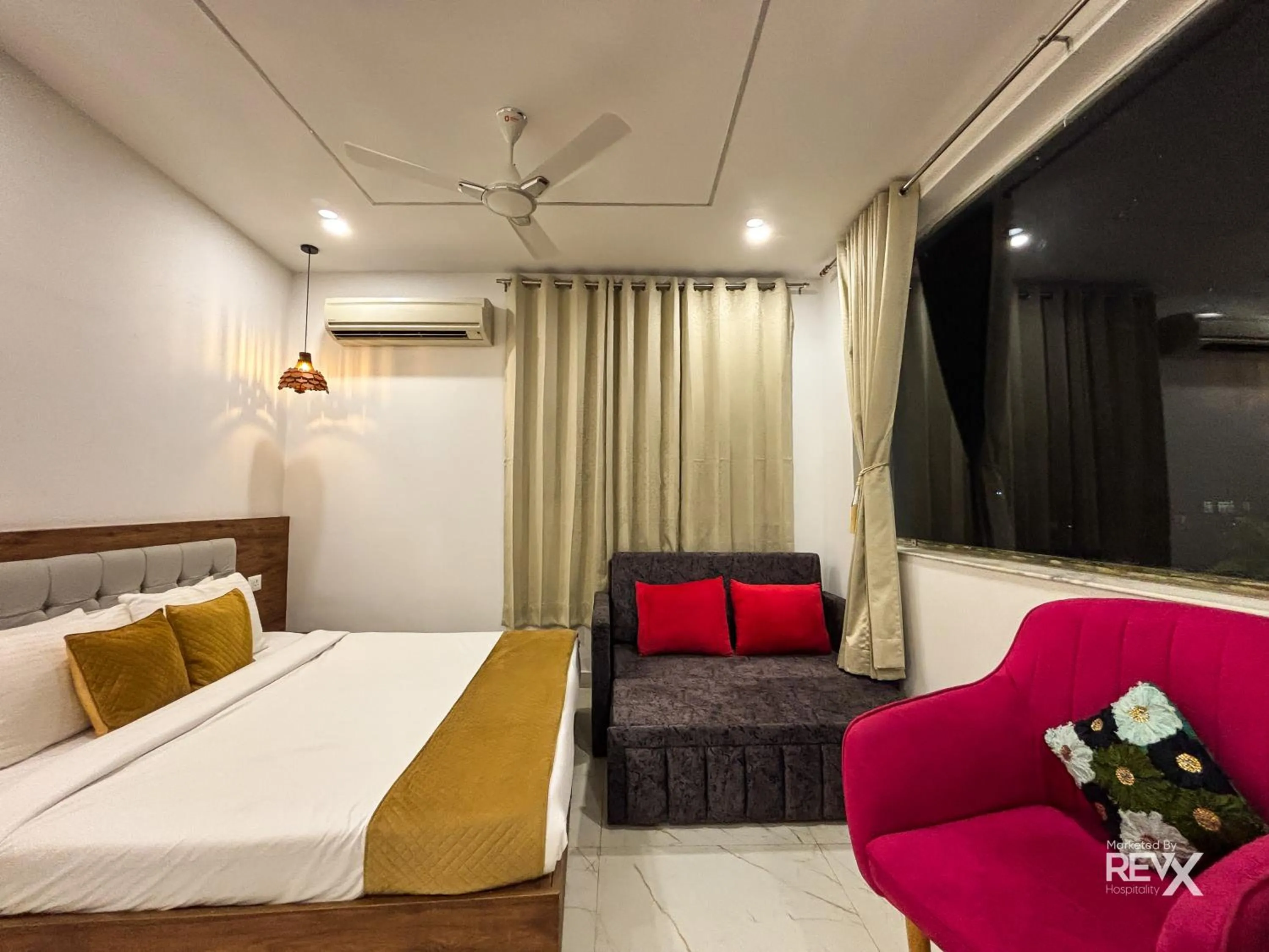 Bed in The Neeraj River Forest Resort Ayurvedic Wellness Center