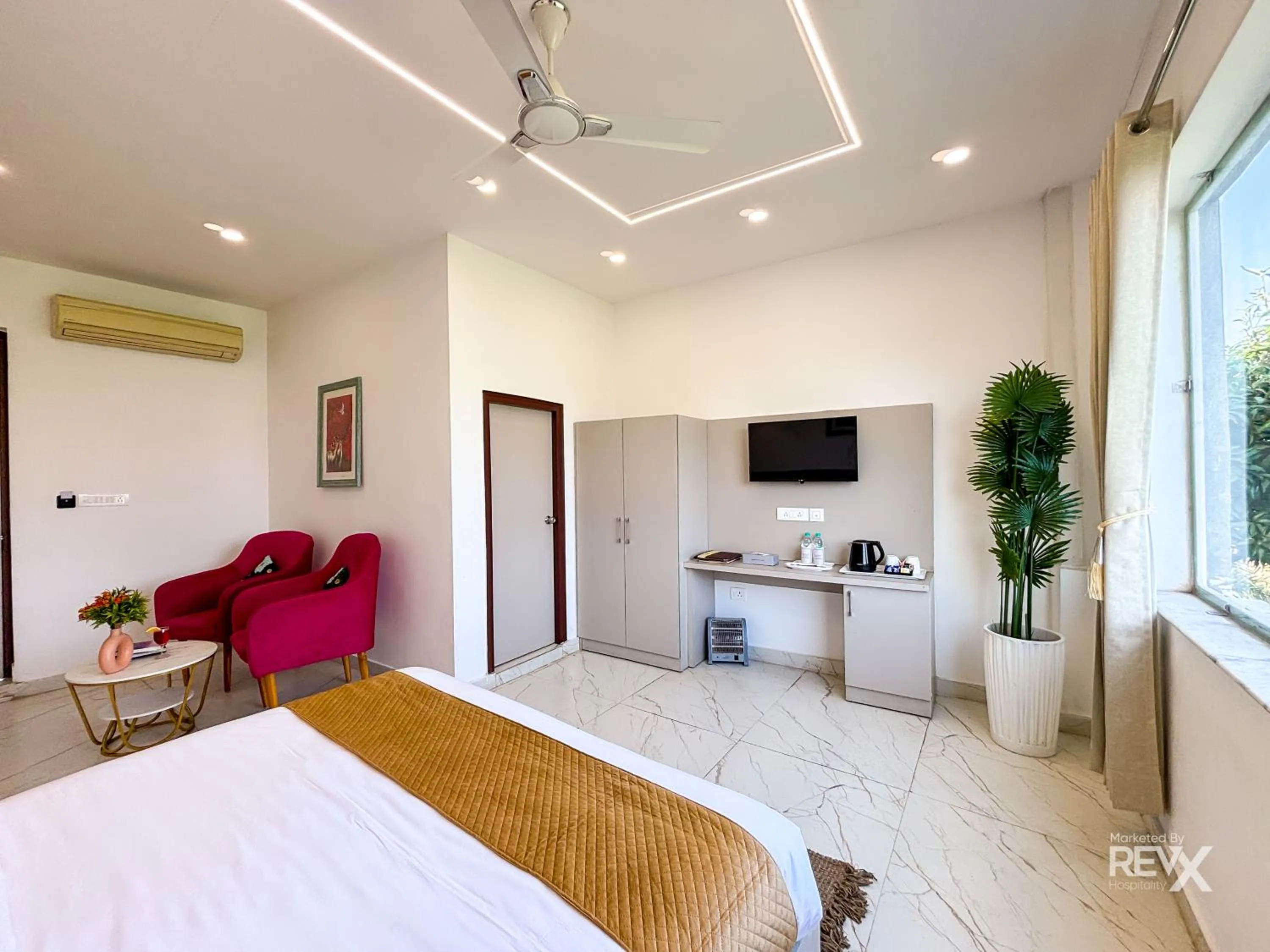 Bed in The Neeraj River Forest Resort Ayurvedic Wellness Center