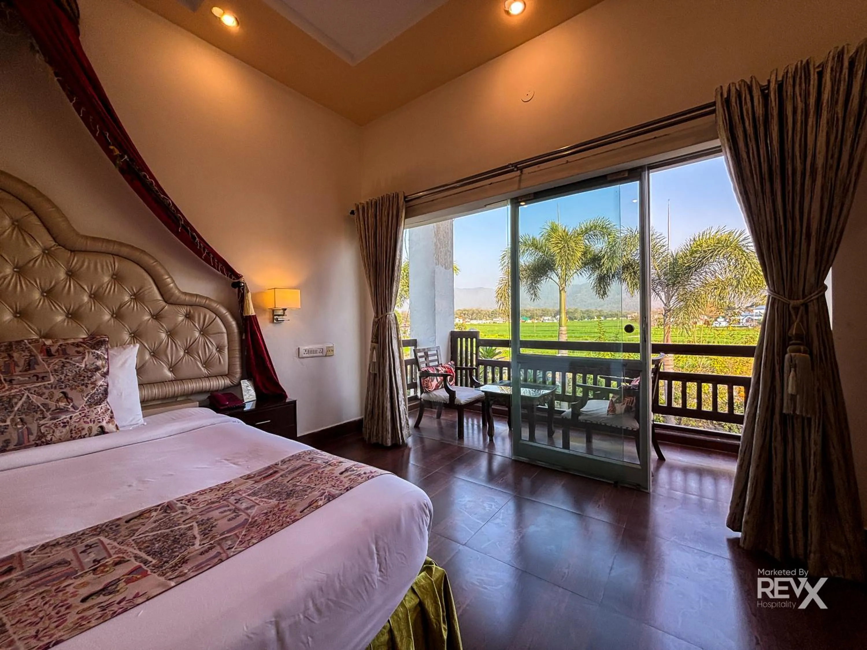 Bed in The Neeraj River Forest Resort Ayurvedic Wellness Center