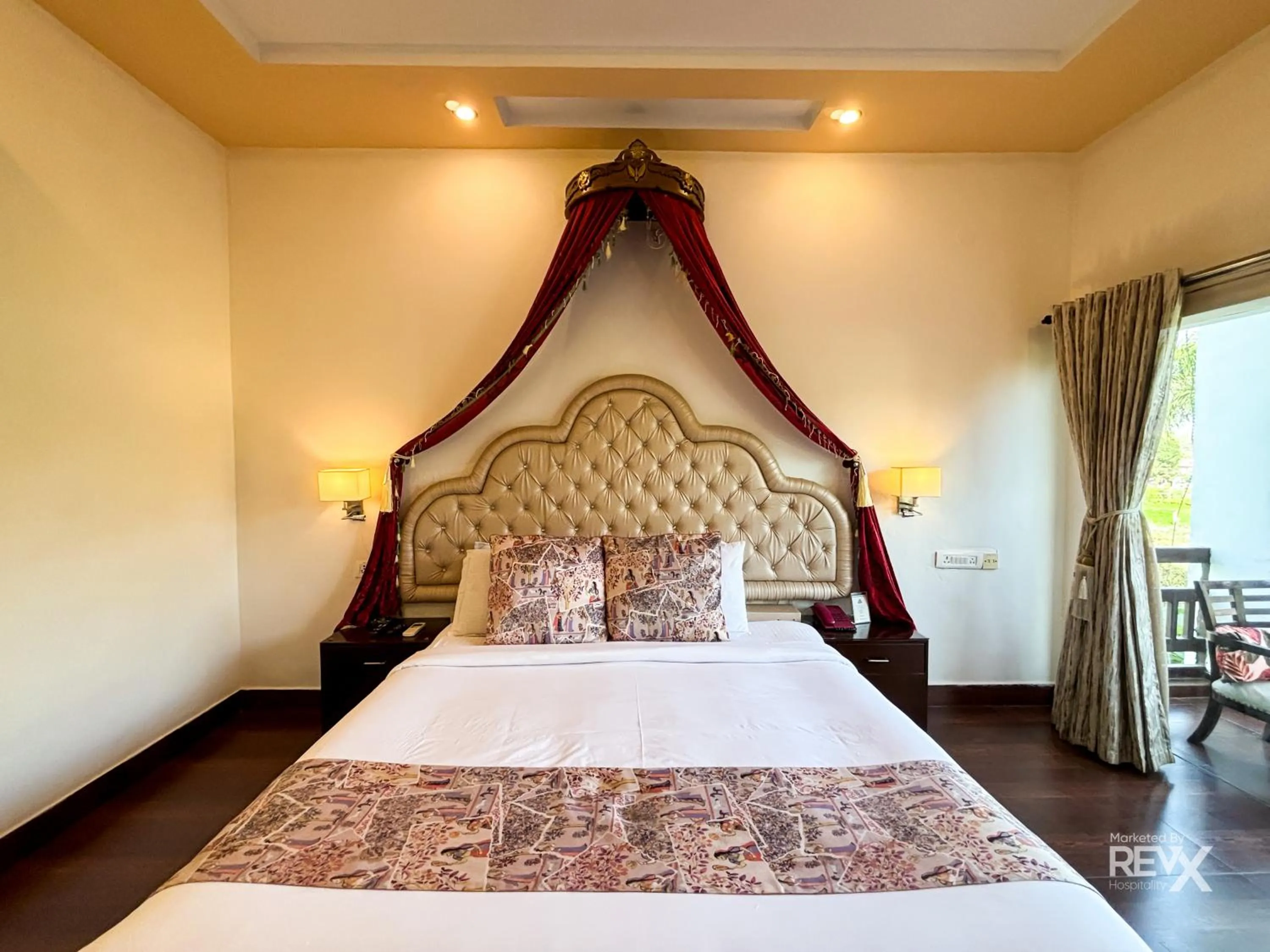 Bed in The Neeraj River Forest Resort Ayurvedic Wellness Center