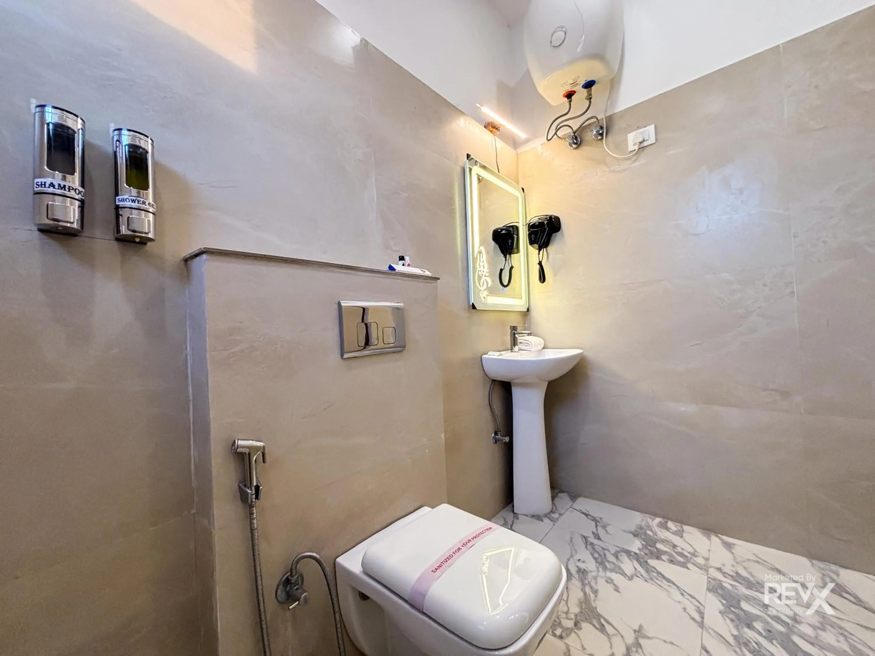 Bathroom in The Neeraj River Forest Resort Ayurvedic Wellness Center