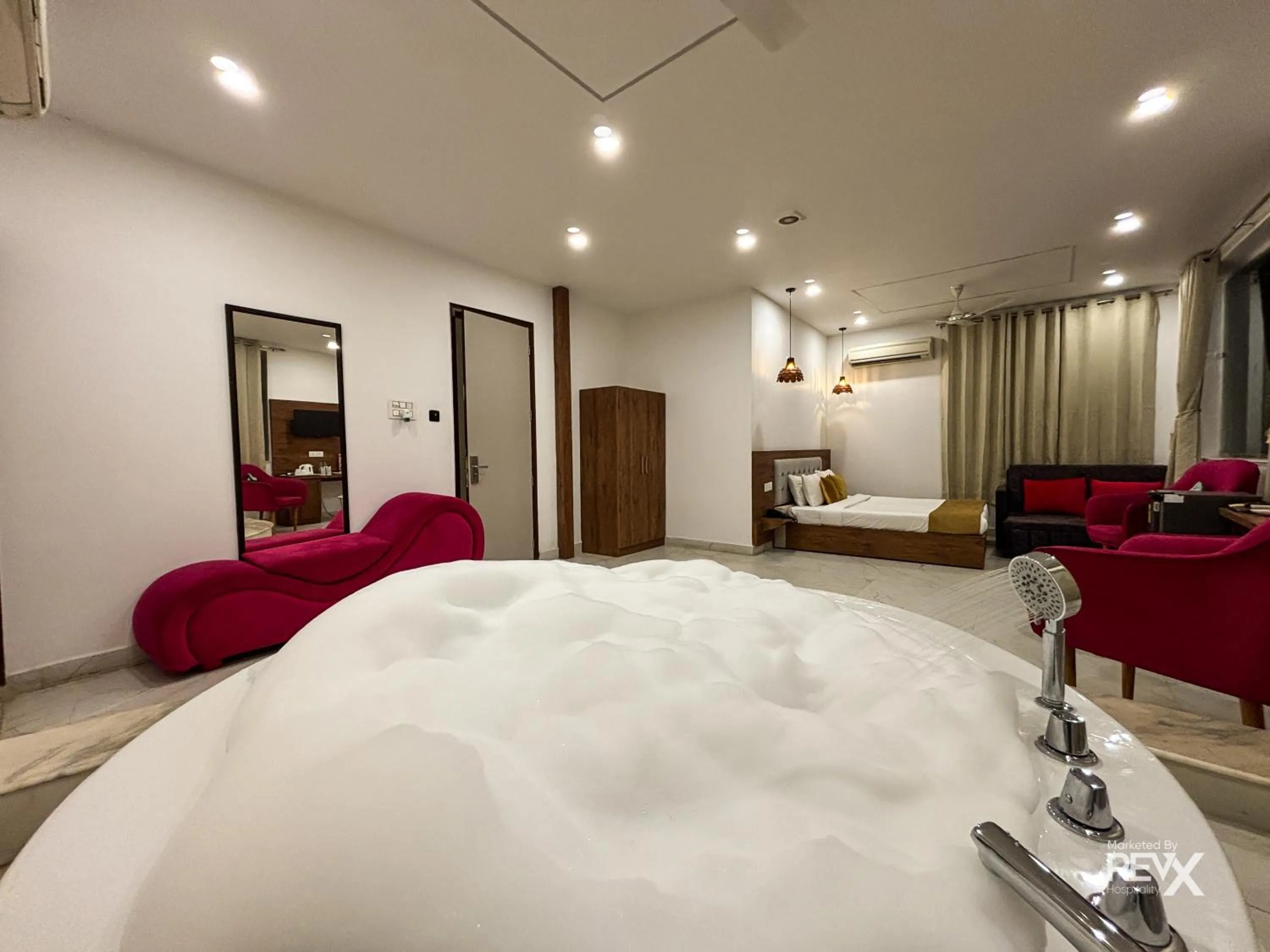 Bed in The Neeraj River Forest Resort Ayurvedic Wellness Center