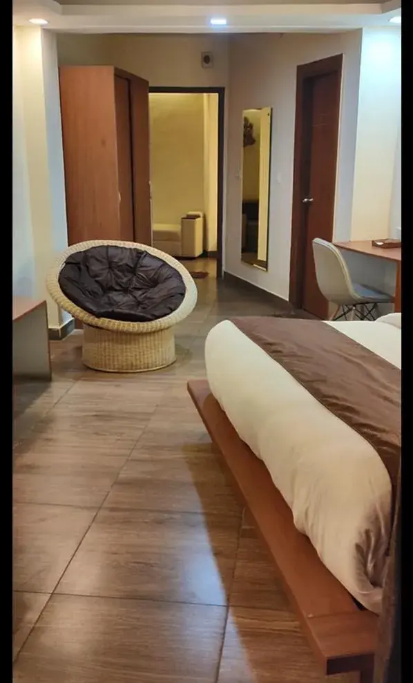 Seating area, Bed in Icebergs Mussoorie - A Boutique stay and 24 hrs roof top cafe Seating area, Bed in Icebergs Mussoorie - A Boutique stay and 24 hrs roof top cafe