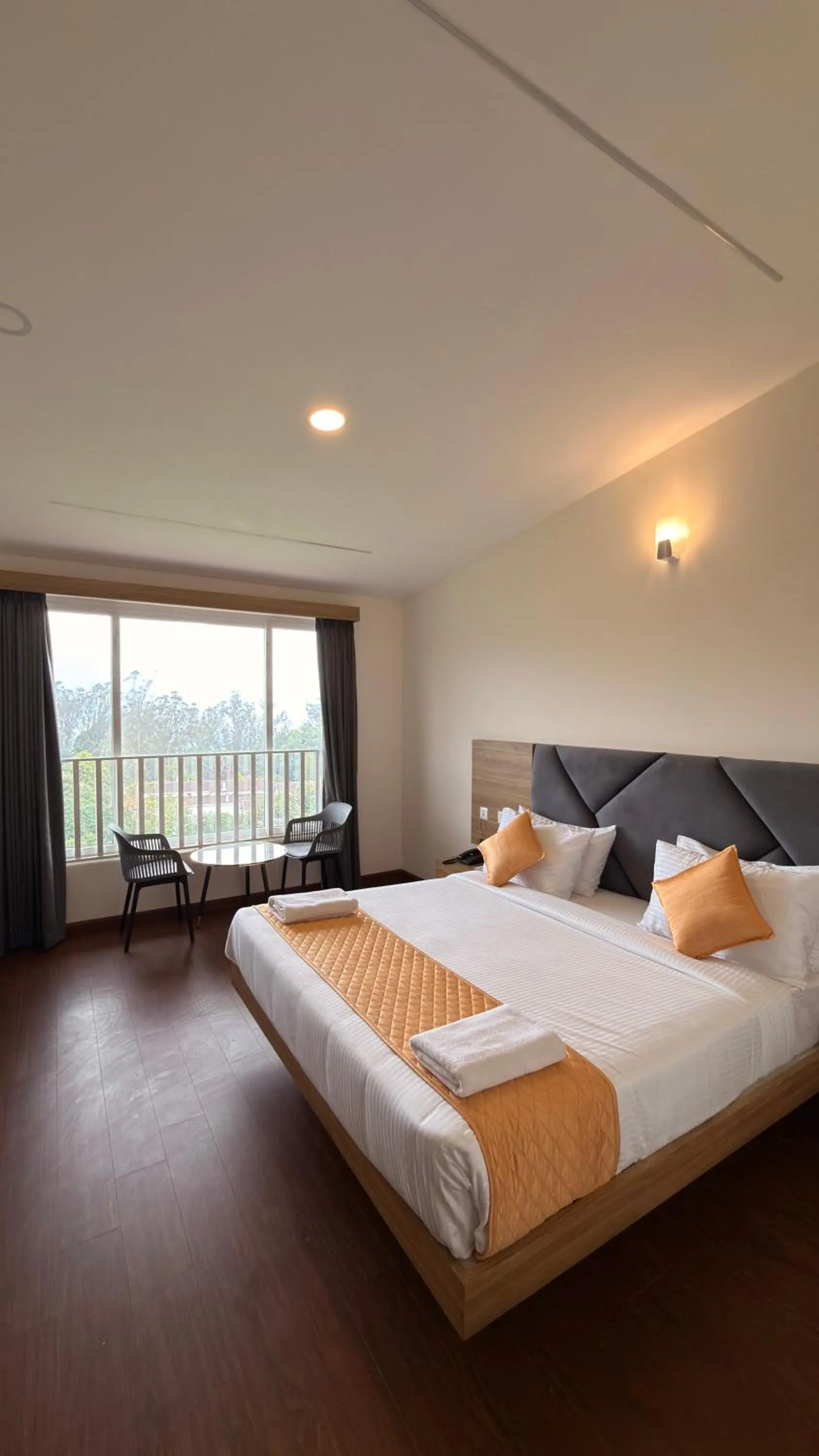 Bed in Yantra Resort, Ooty