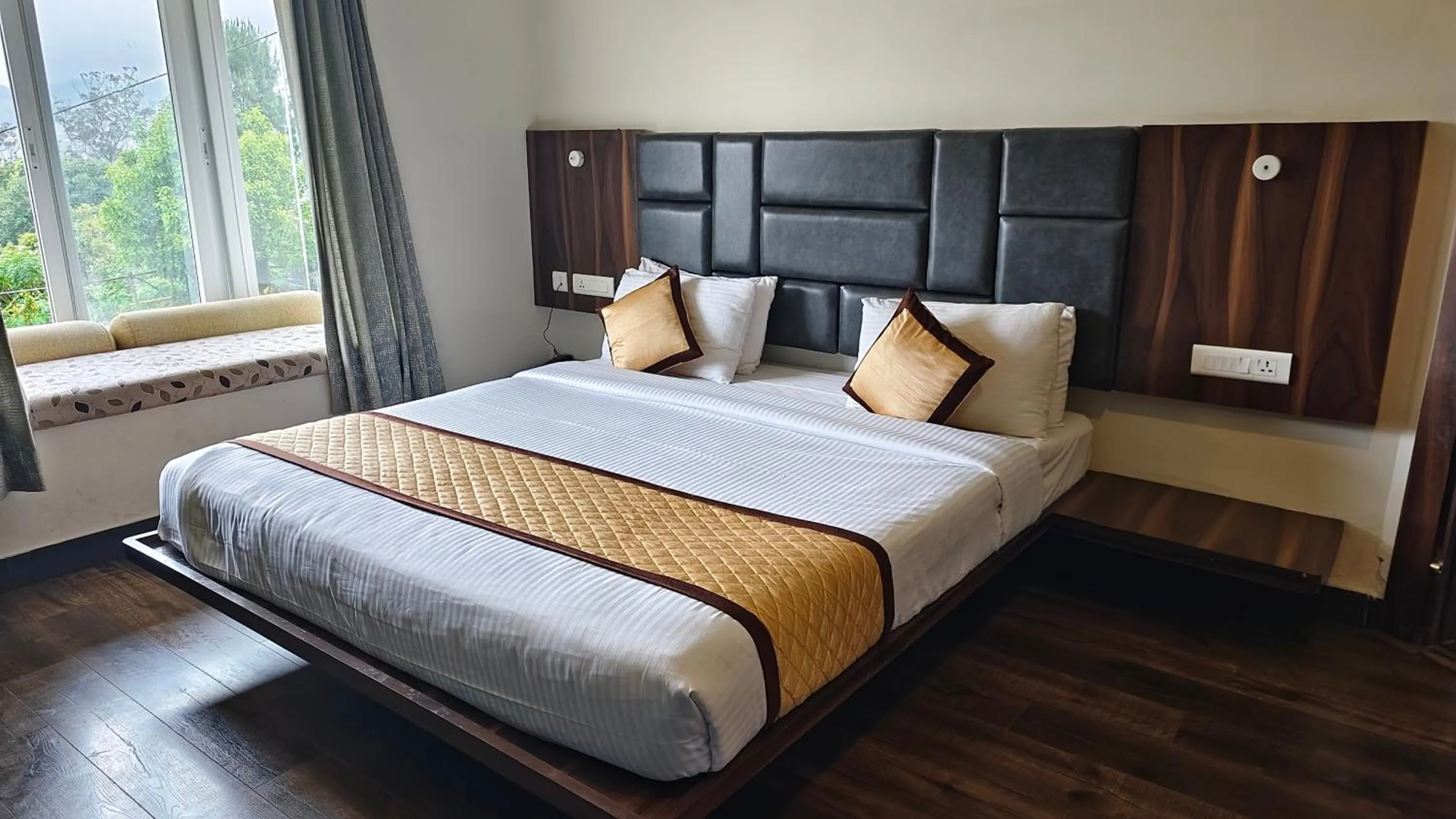 Bed in Yantra Resort, Ooty