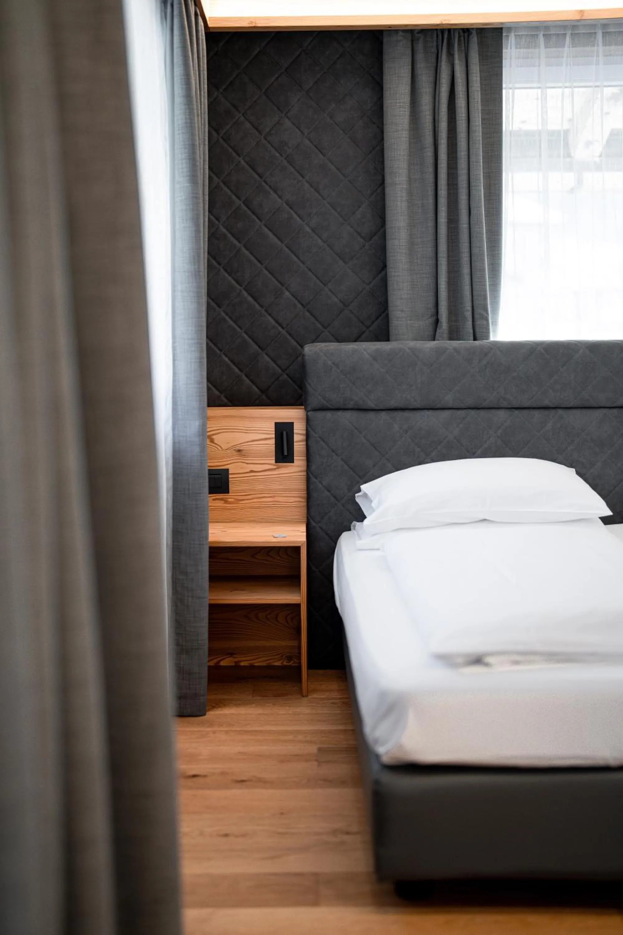 Bed in Croce Bianca Leisure & Spa Hotel