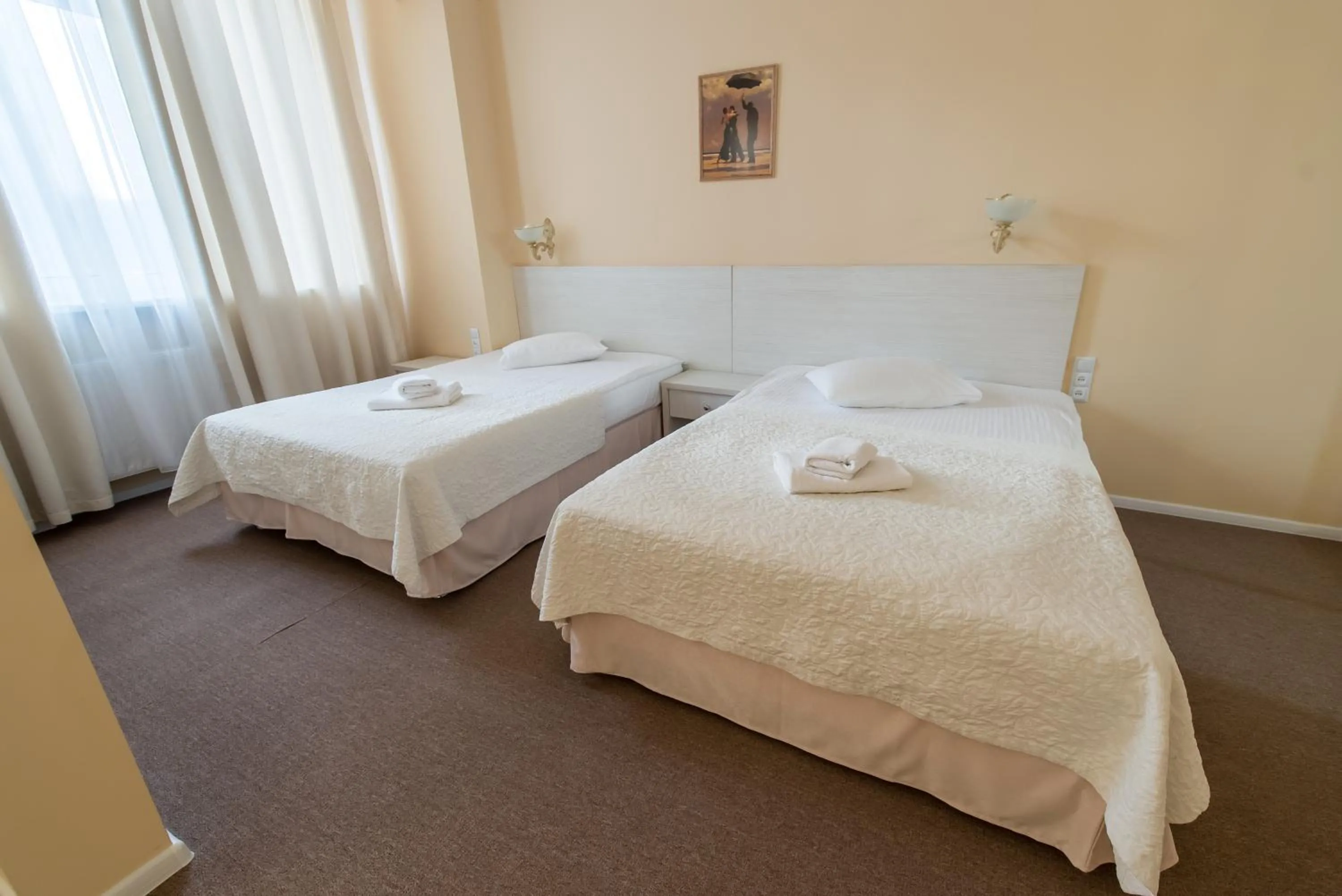 Photo of the whole room, Bed in light hotel & hub