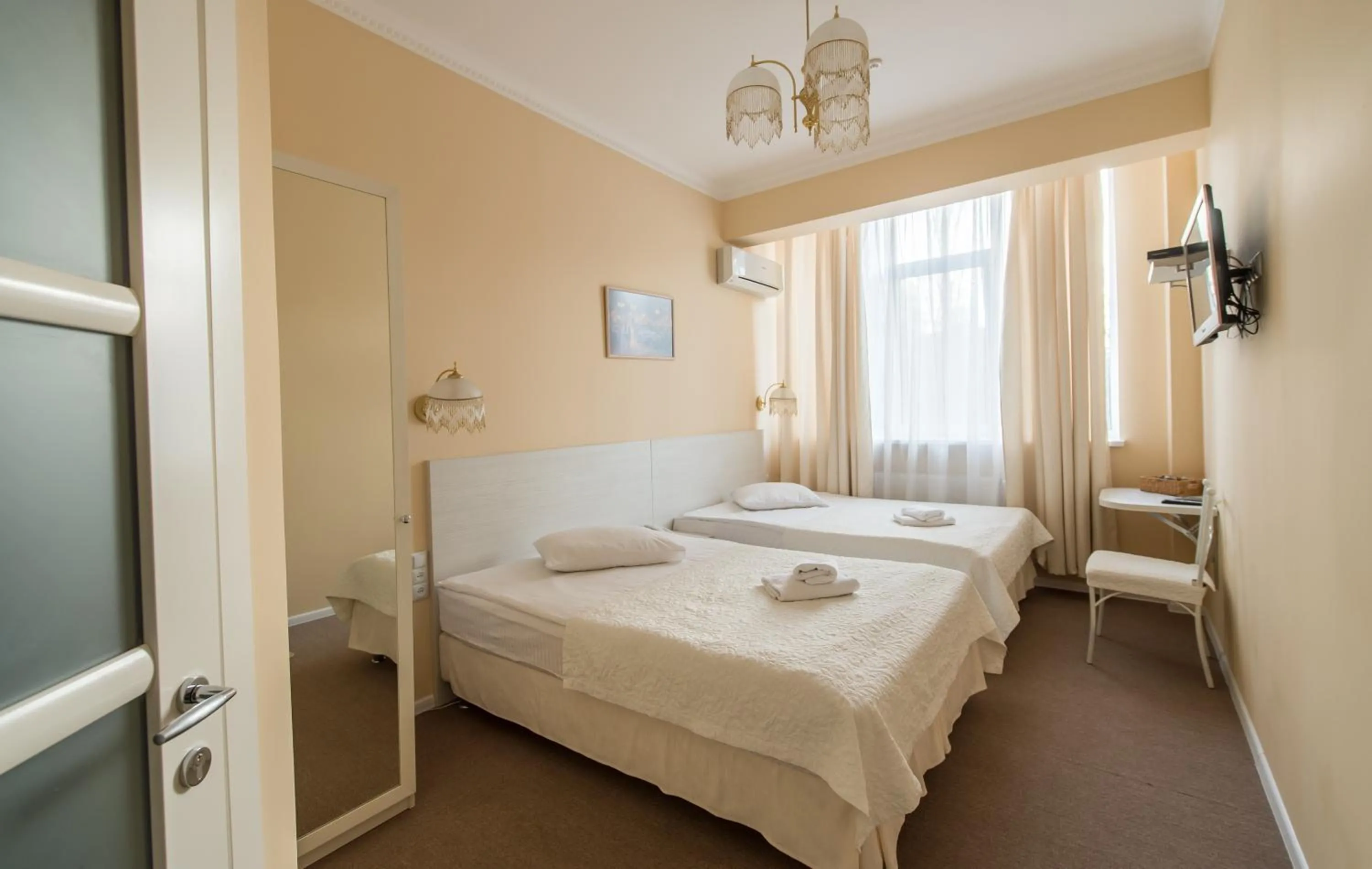 Photo of the whole room, Bed in light hotel & hub