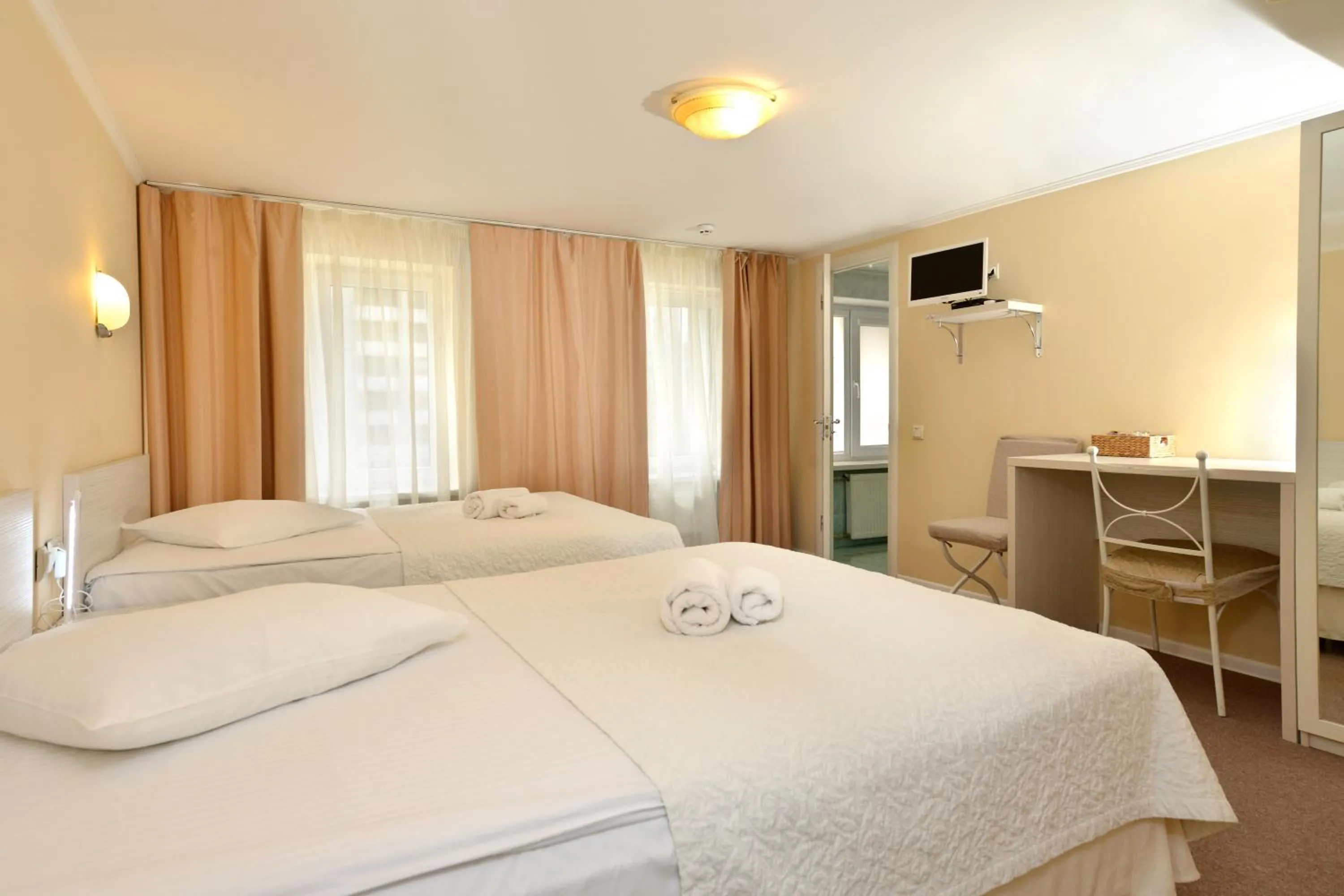 Bed in light hotel & hub