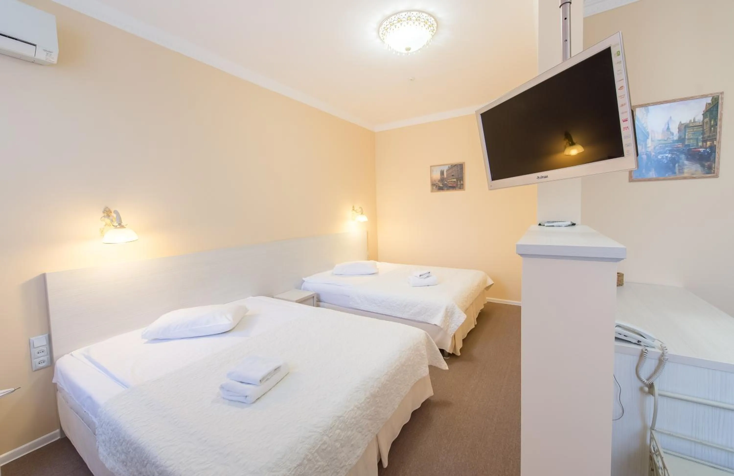 Photo of the whole room, Bed in light hotel & hub