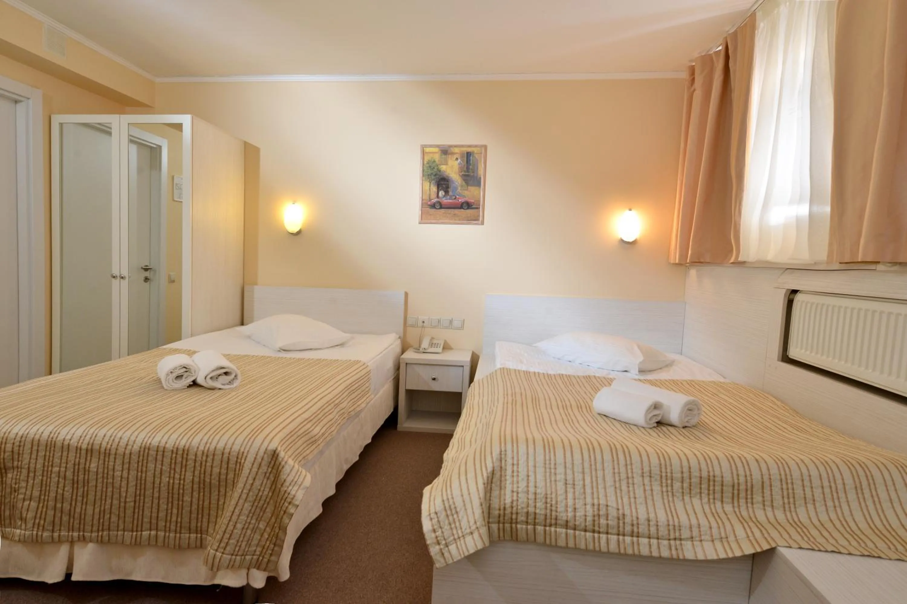 Bed in light hotel & hub