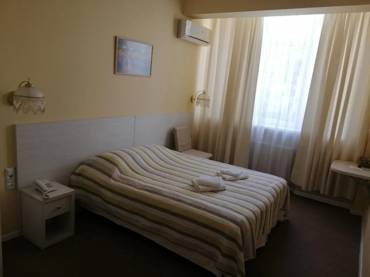 Bed in light hotel & hub