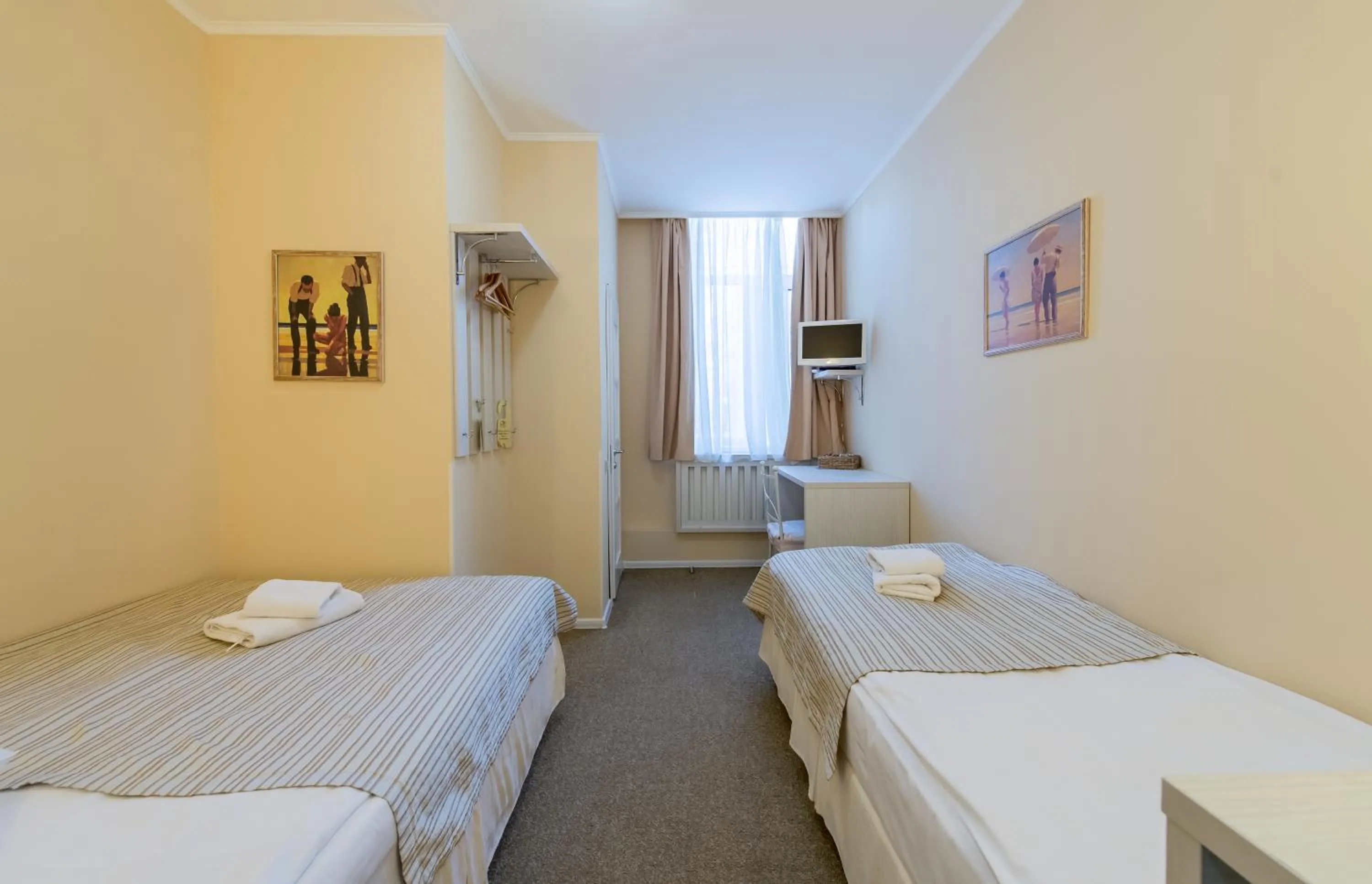 Photo of the whole room, Bed in light hotel & hub