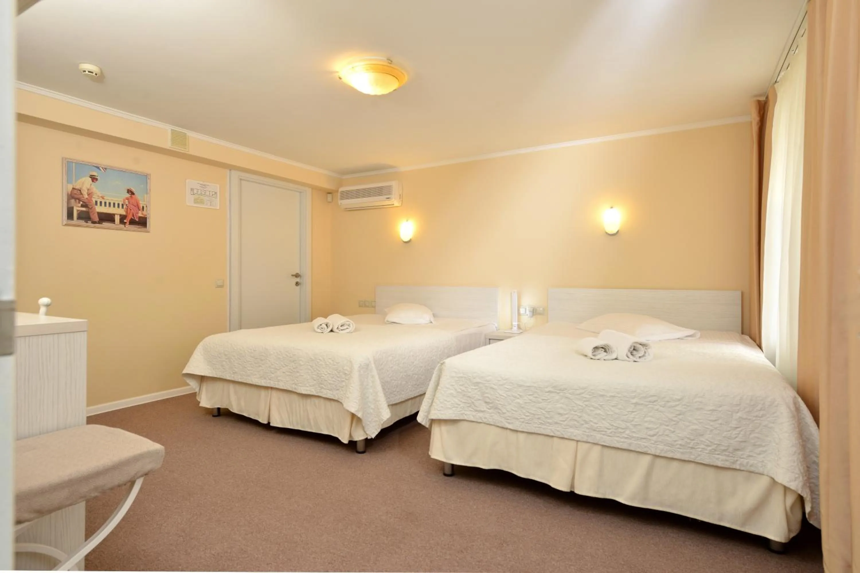 Bed in light hotel & hub