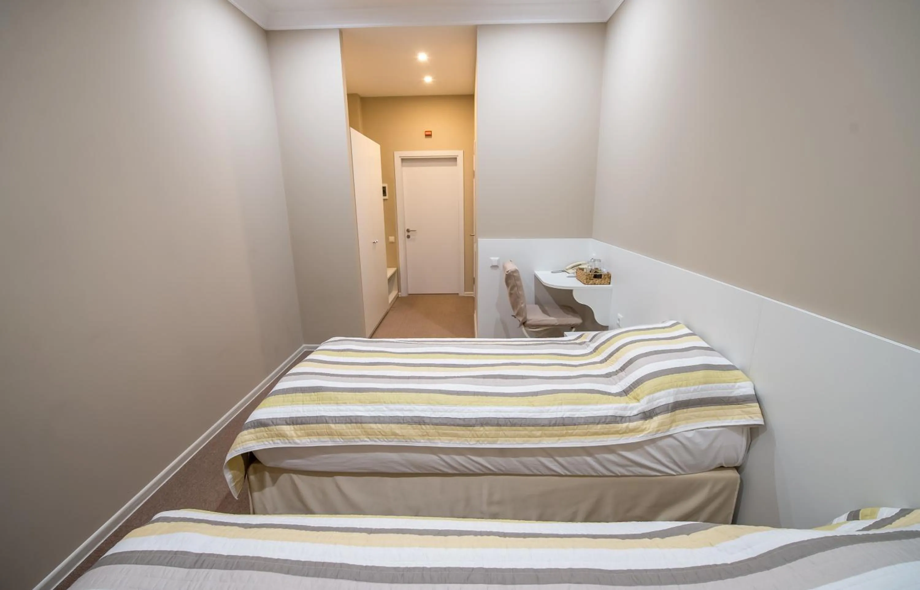 Photo of the whole room, Bed in light hotel & hub